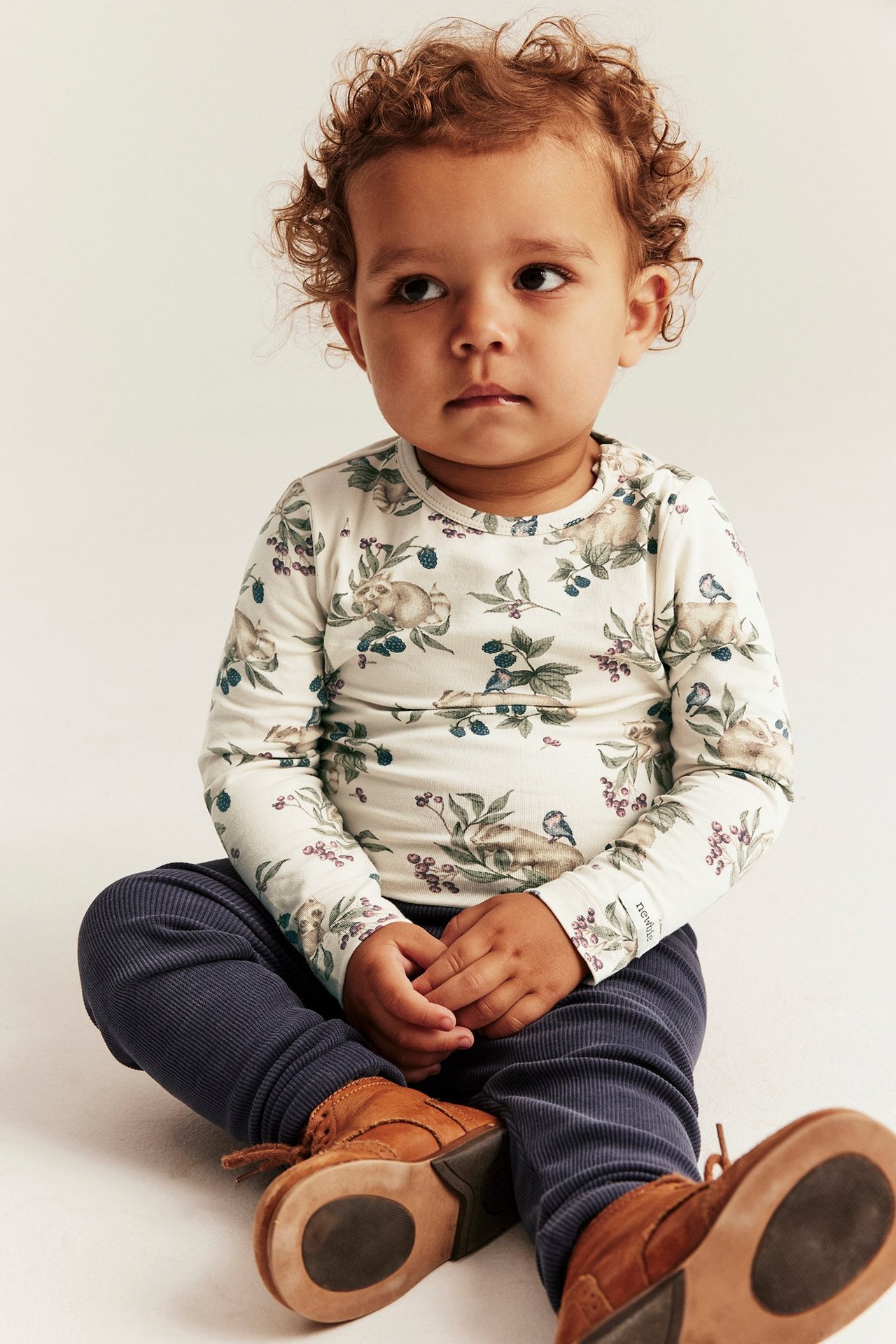 Patterned bodysuit with long sleeves