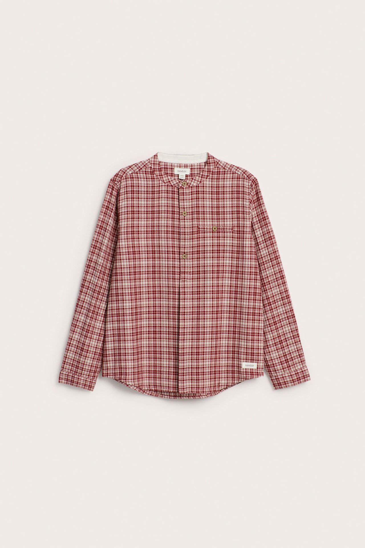Front view of a red and off-white plaid cotton shirt with long sleeves and a mandarin collar.