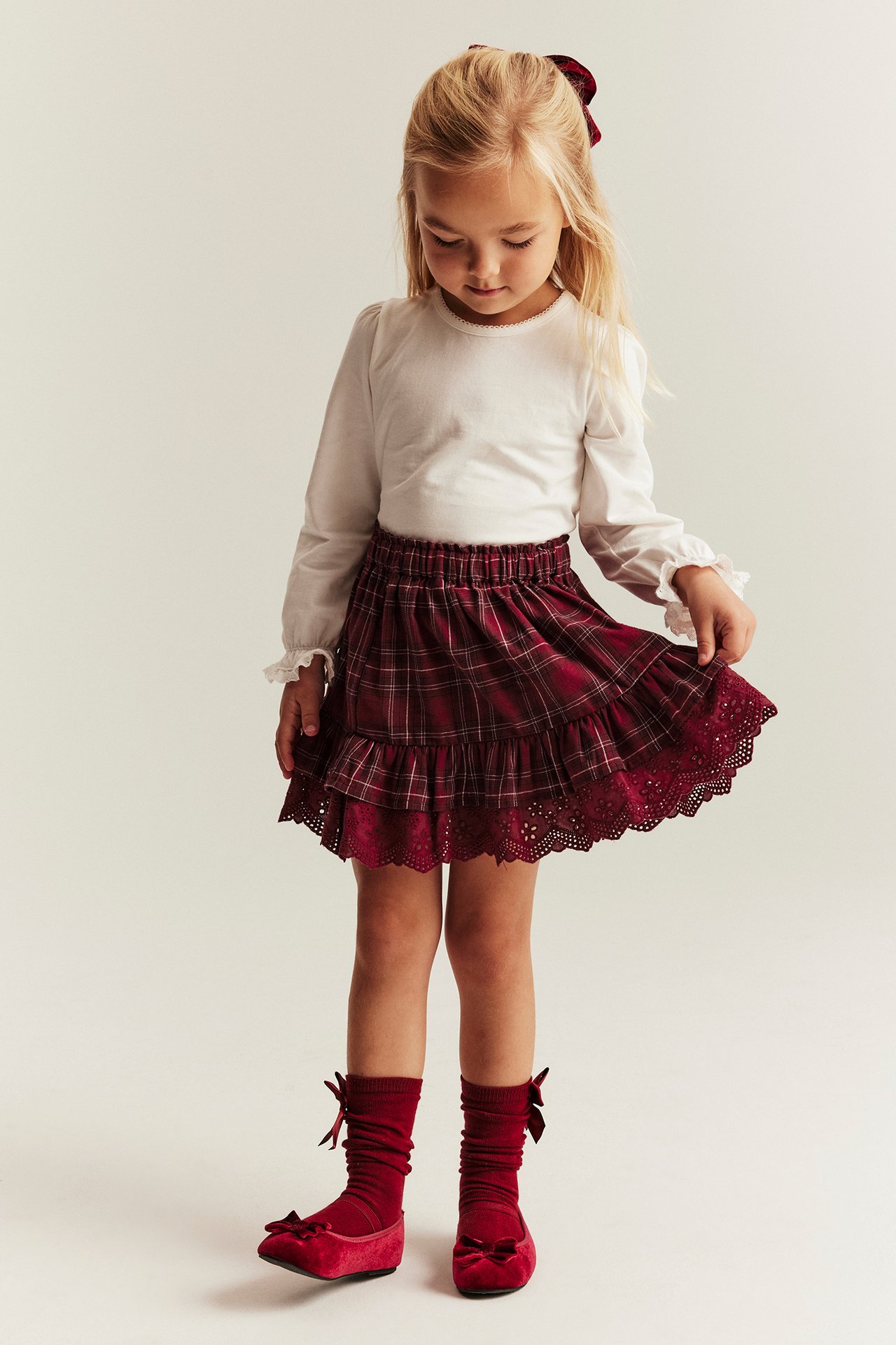 Red plaid skirt with ruffles, lace, adjustable waistband, for woman or boy.