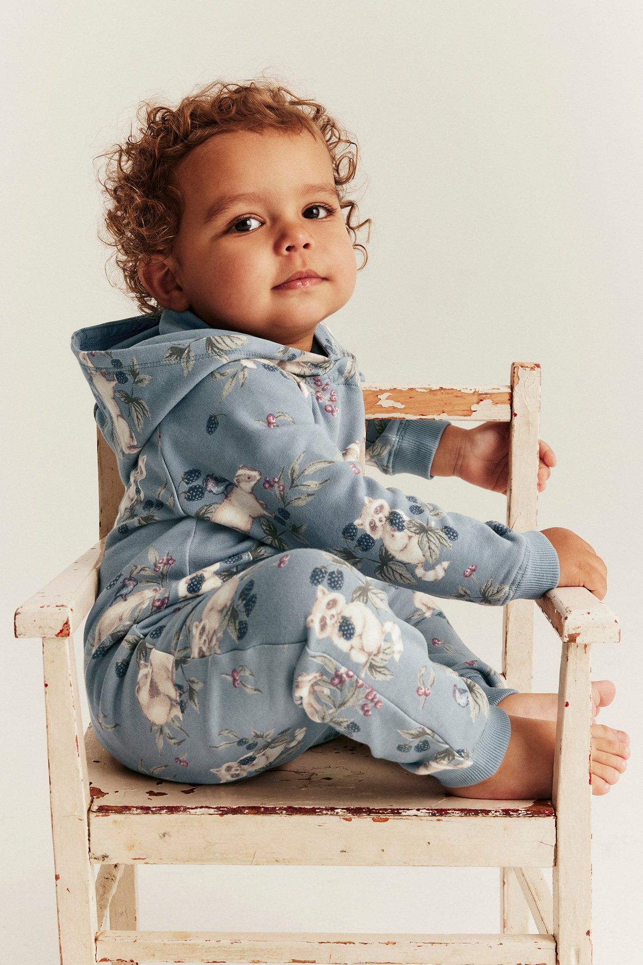 Patterned jumpsuit with hood