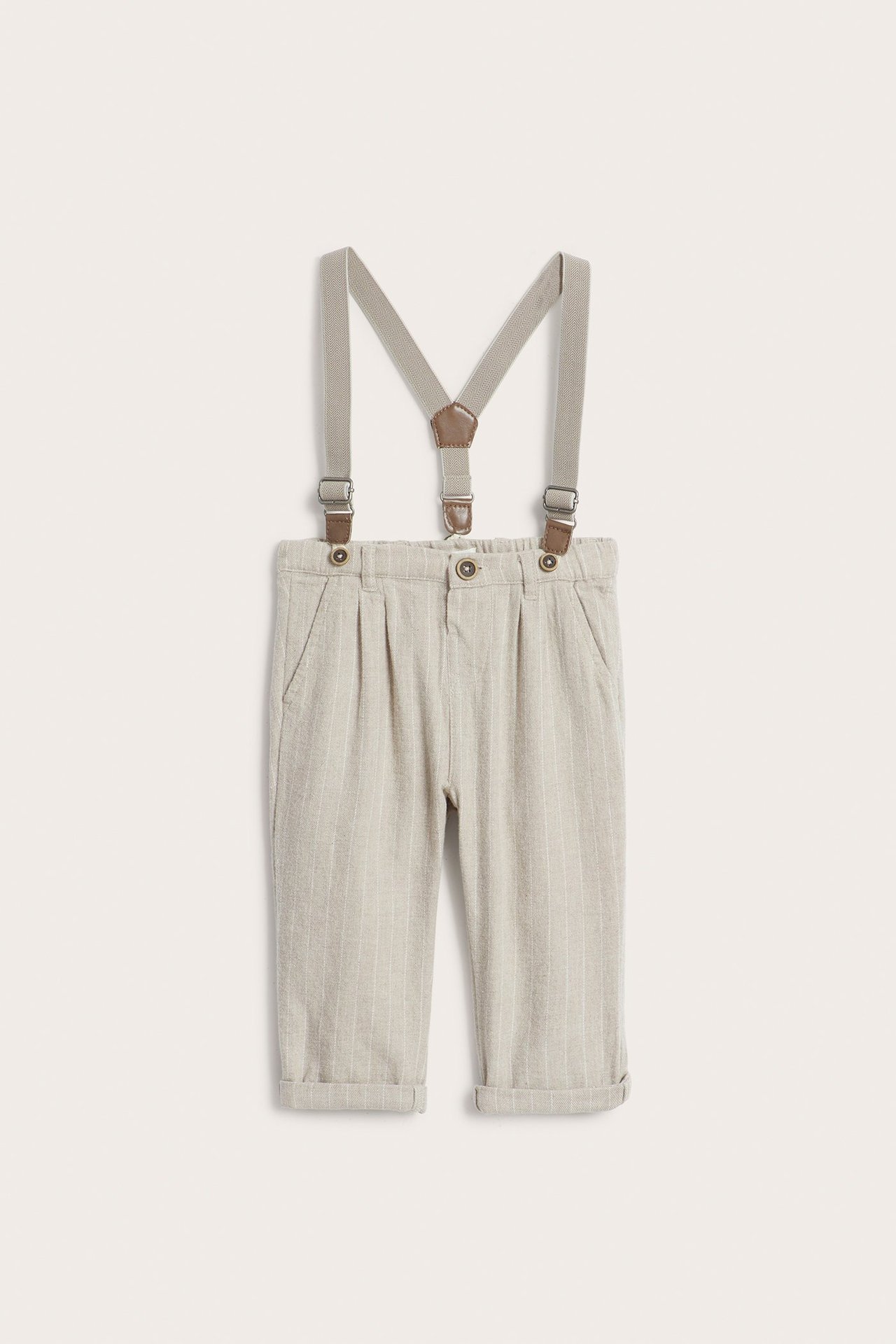 Front view of kids' beige melange pinstripe woven pants with adjustable suspenders and cuffed hems.