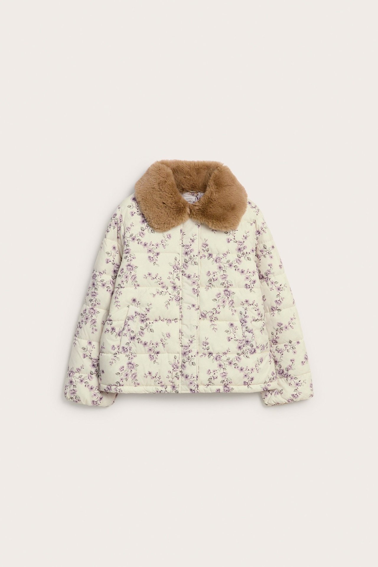 Front view: Woman's light beige floral padded jacket with brown faux fur collar.