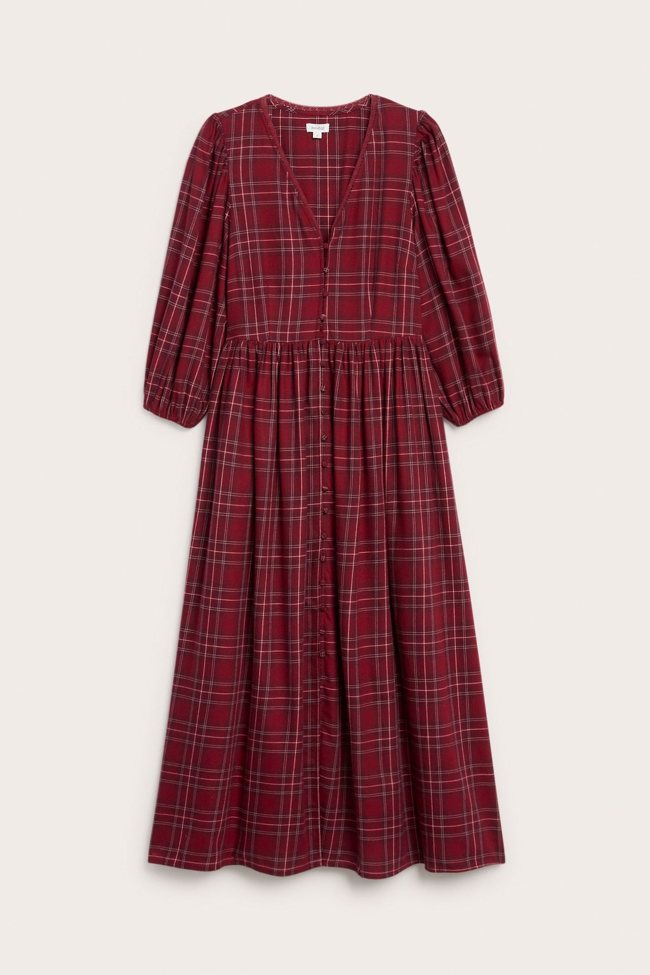 Front view of a woman's red plaid cotton midi dress with puff sleeves and front buttons.