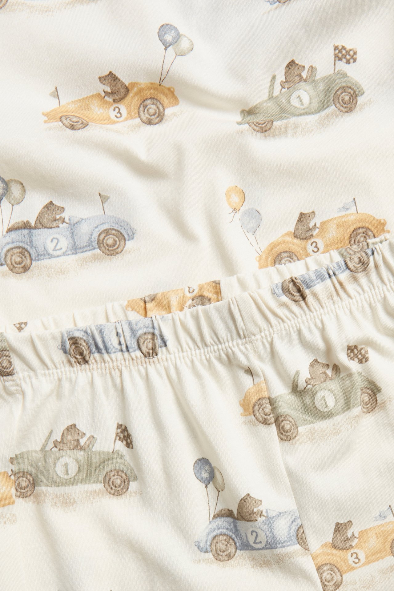 Pajamas with cars and bears print
