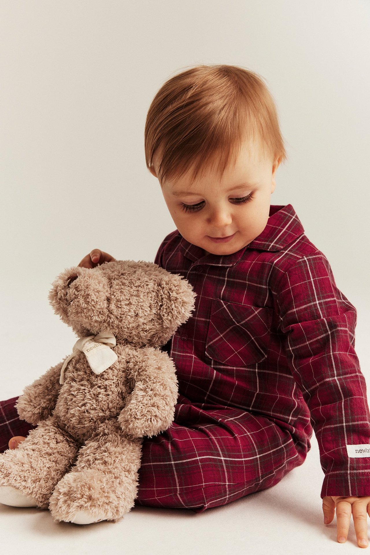 Red plaid cotton kid's pyjamas with front buttons, matching mom and kids, GOTS.