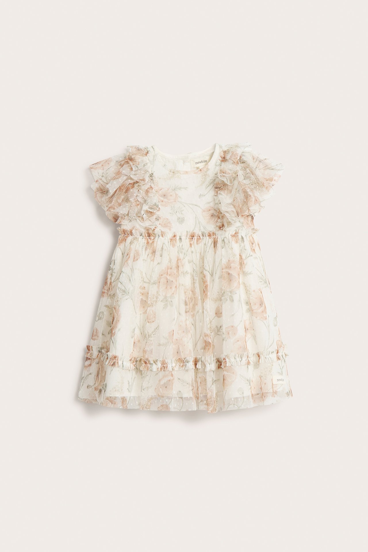Front view: Offwhite baby's floral mesh dress with ruffled sleeves, dotted texture, waist/hem ruffles, and back buttons.