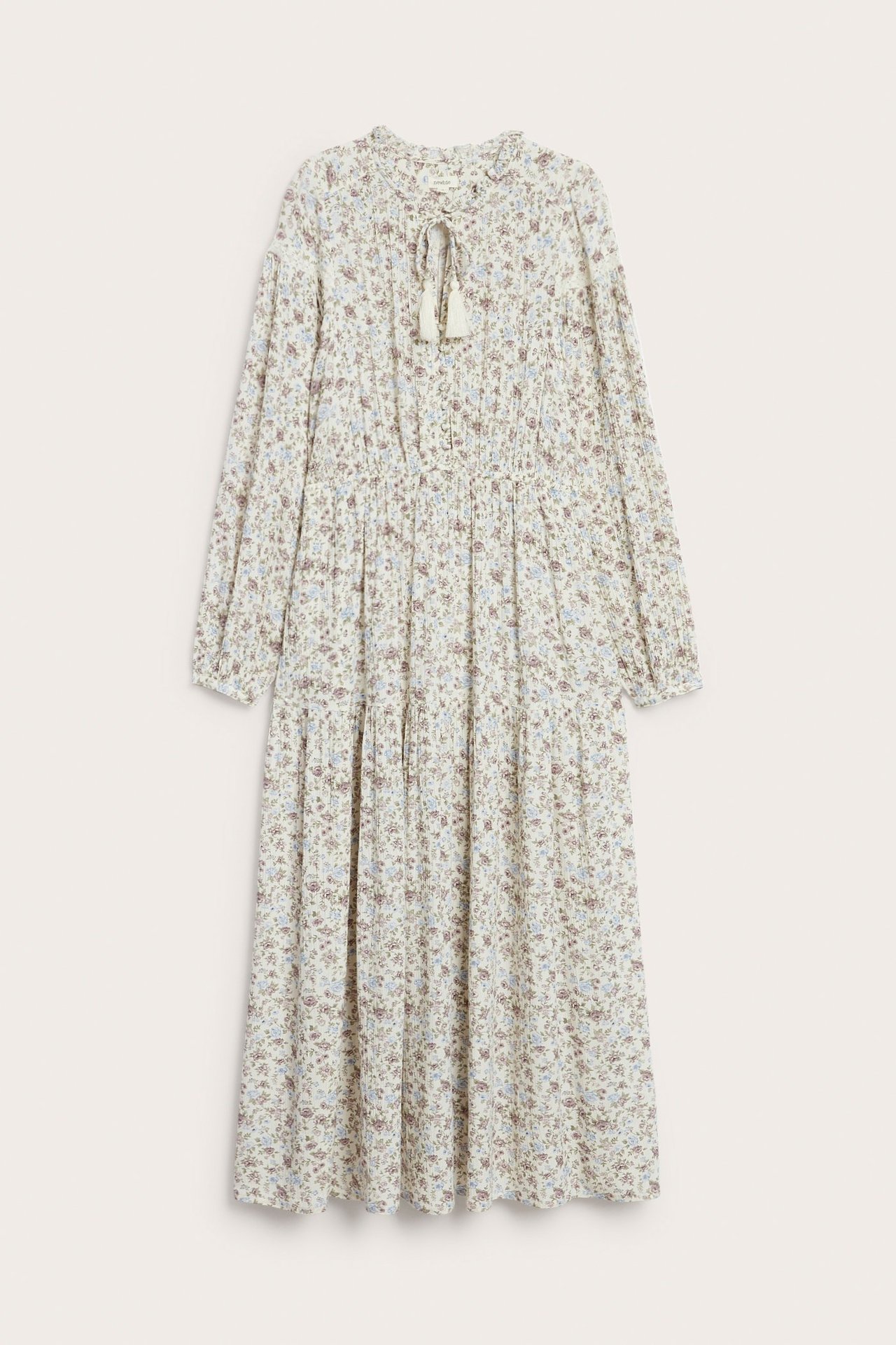 Front view: Off-white floral viscose long dress with ruffle collar, tie bands, elastic waist, puff sleeves.