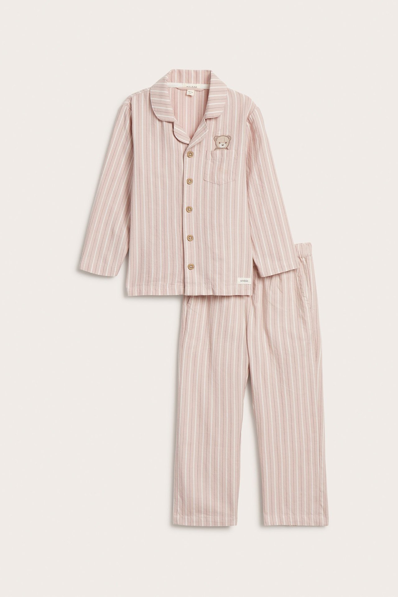 Front view, light pink striped kid's cotton pajama set with buttoned top and teddy bear embroidery.
