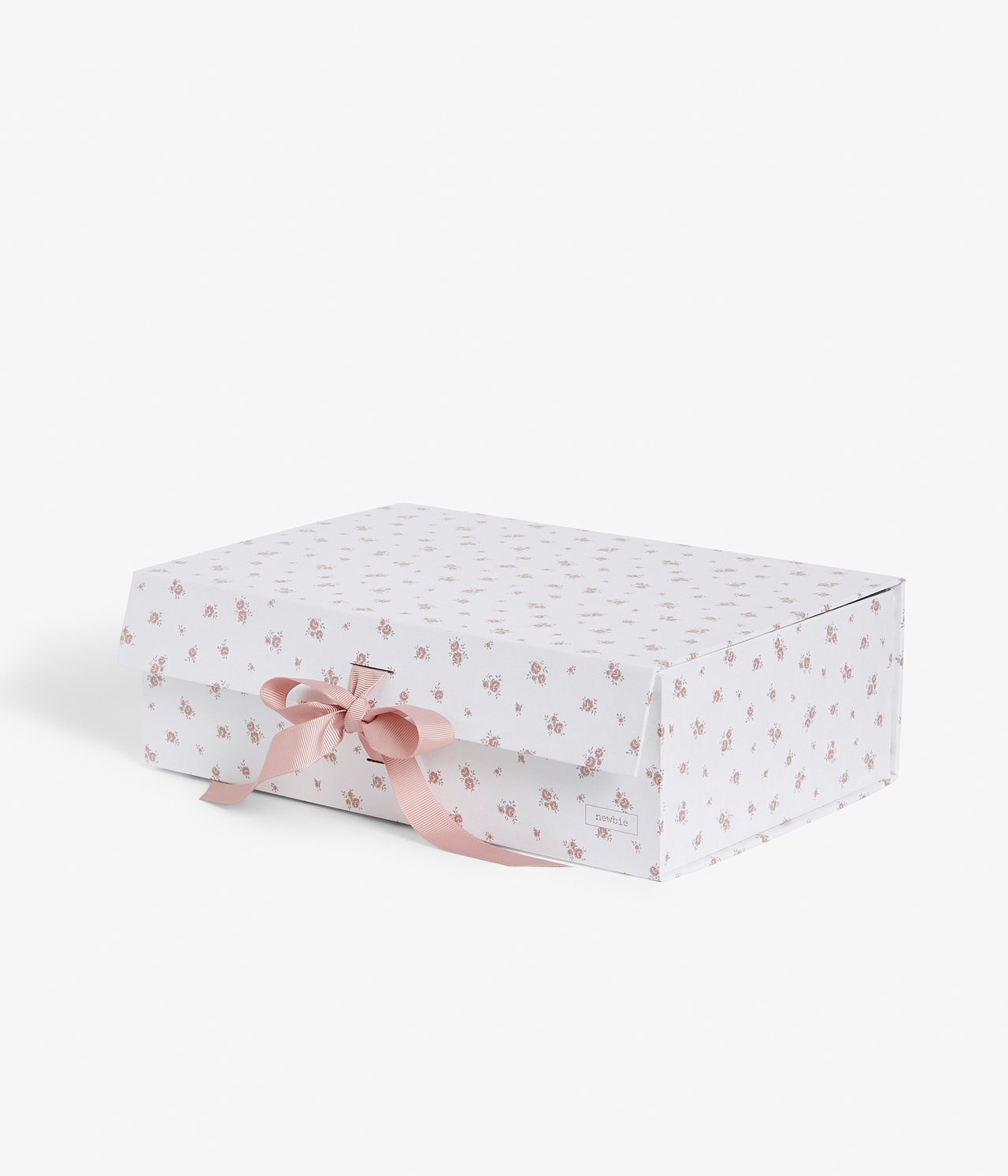 Front view of an off-white paper gift box with a pink floral pattern and a pink ribbon bow.