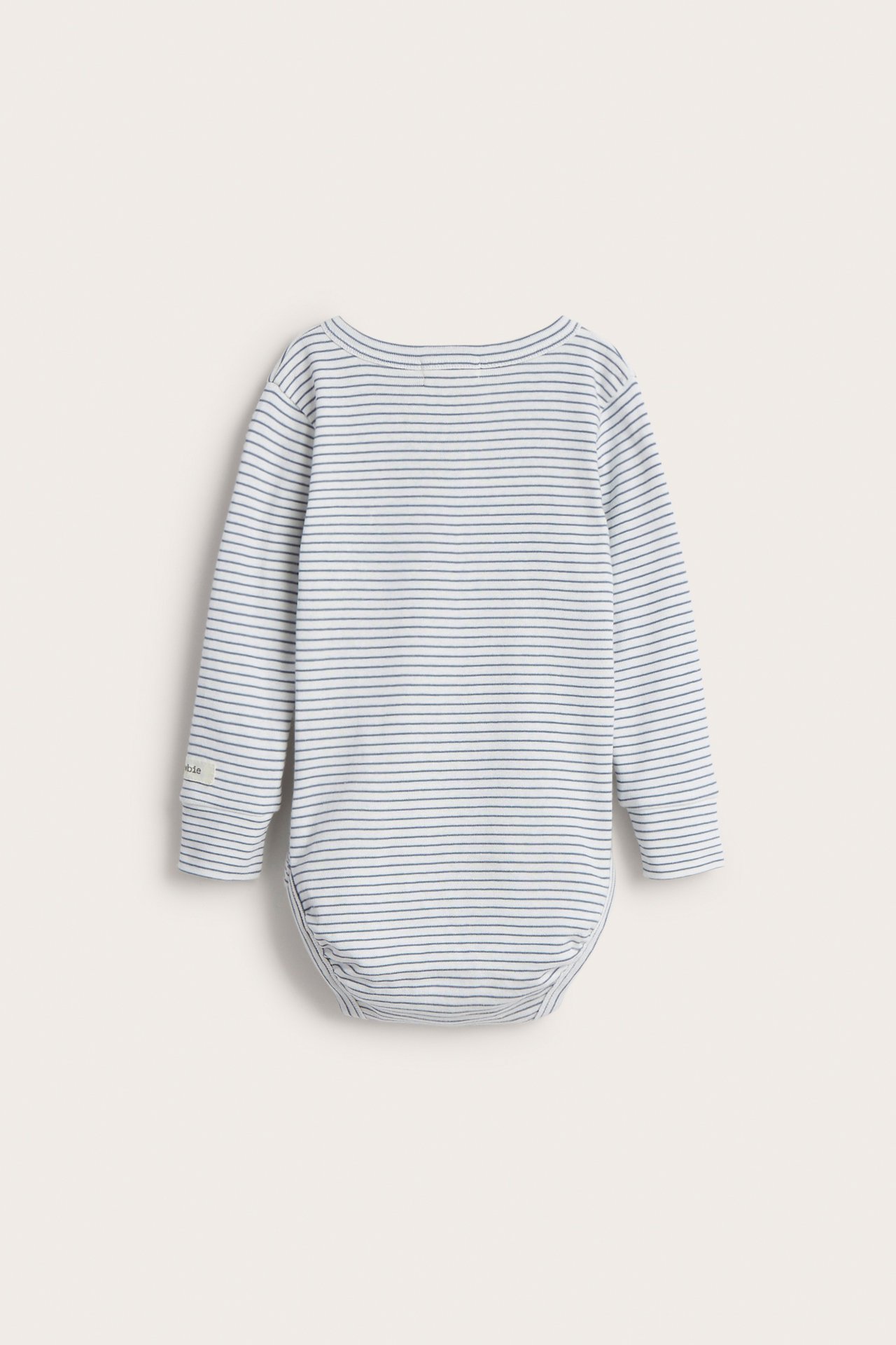 Back view of a baby's long-sleeved white and blue striped cotton bodysuit.