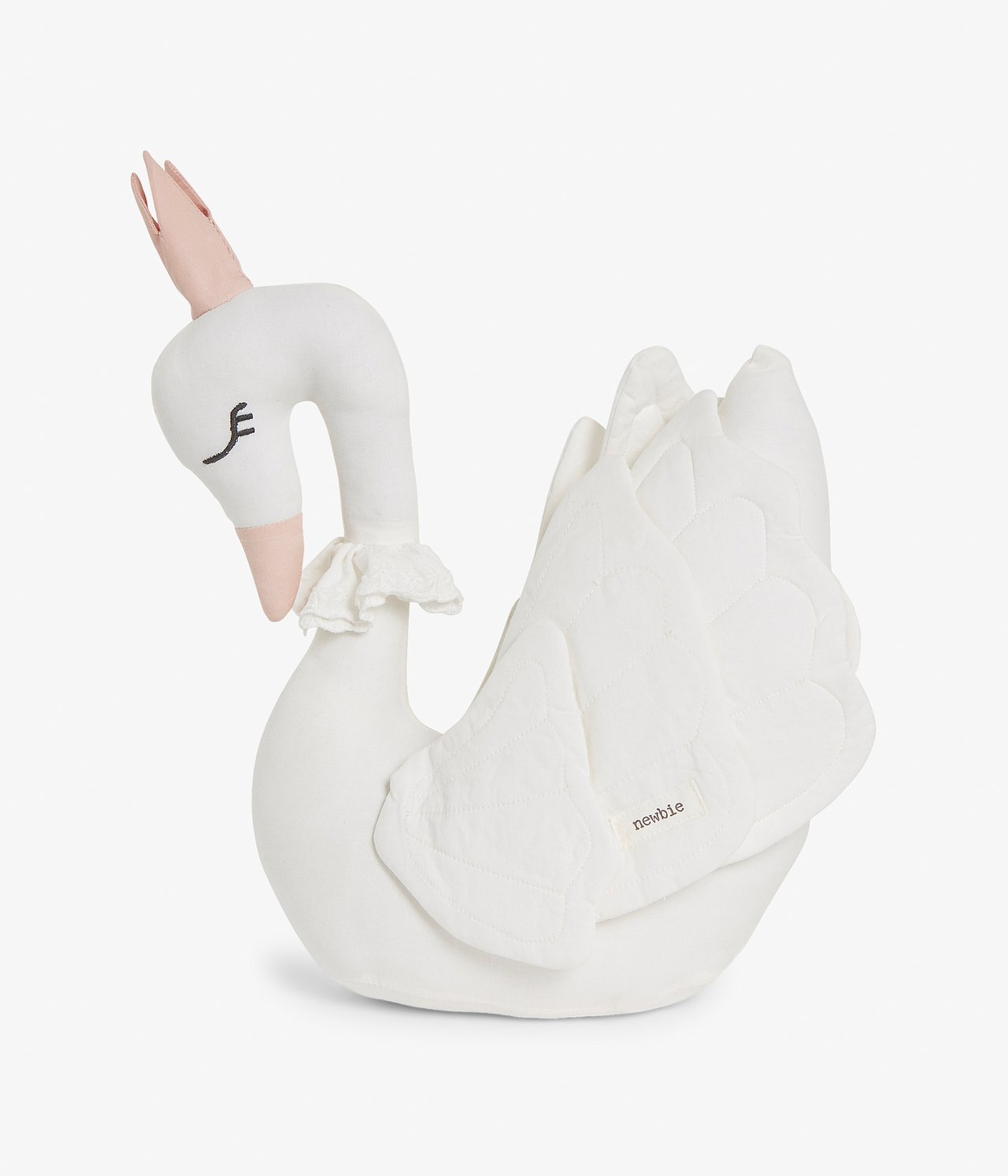 Front view of an off-white cotton swan soft toy with a pink crown and quilted wings.