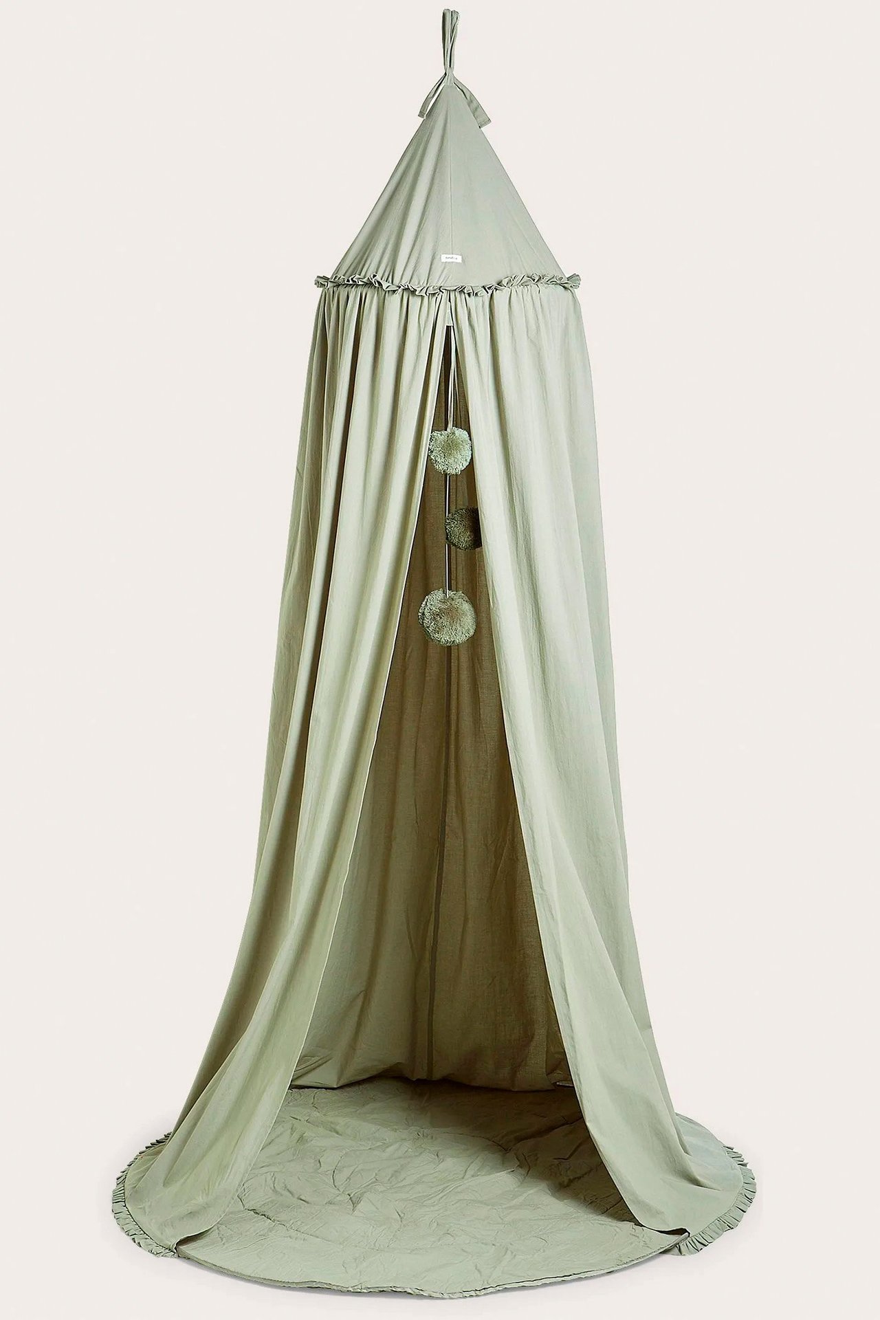 Vorderansicht eines dunkelgrünen Leseteltes mit Rüschenrand, hängenden Pompons und gepolstertem Boden.