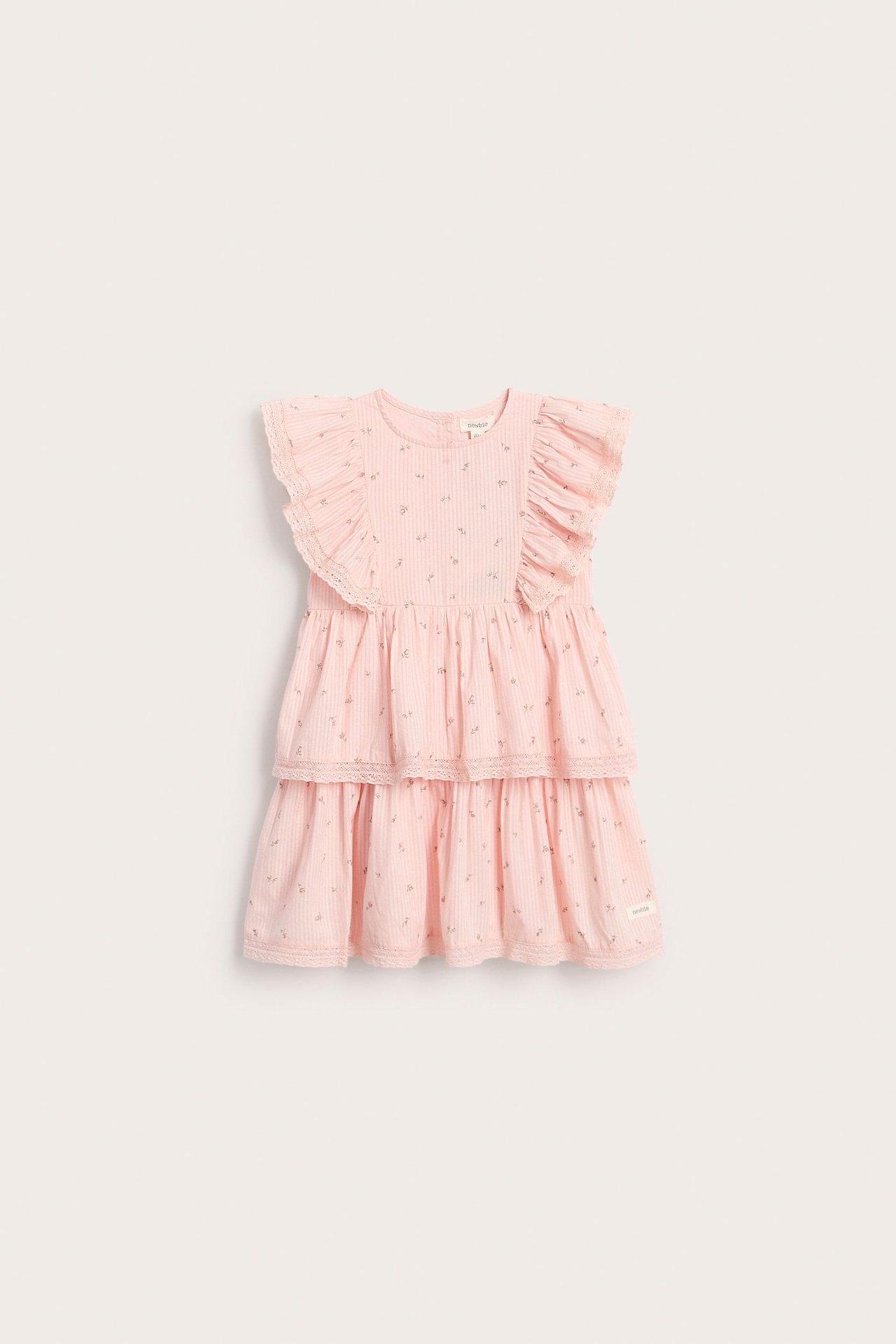 Vorderansicht: Hellrosa gestreiftes Babykleid mit Blumenmuster, Rüschen und mehrstufigem Rock mit Spitzenbesatz.