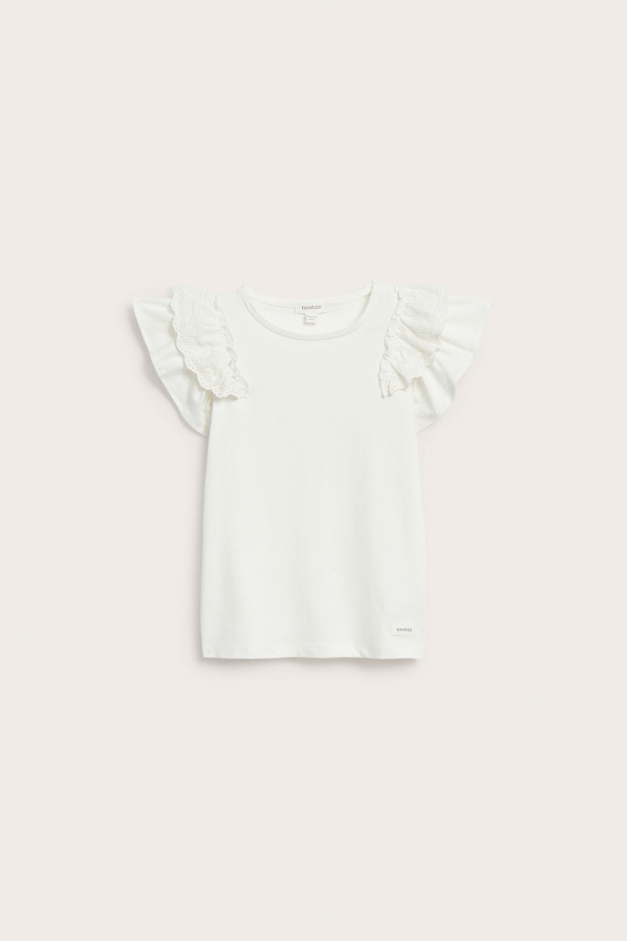 Front view of a kid's off-white short-sleeved cotton top with ruffled sleeves and lace details.