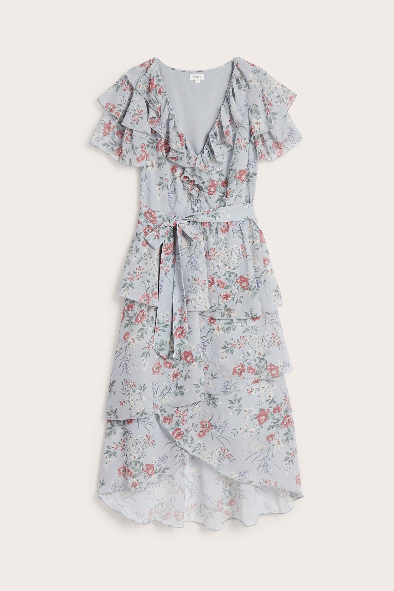 Front view of a light blue floral chiffon dress with ruffled V-neck, tiered skirt, and tie waist.