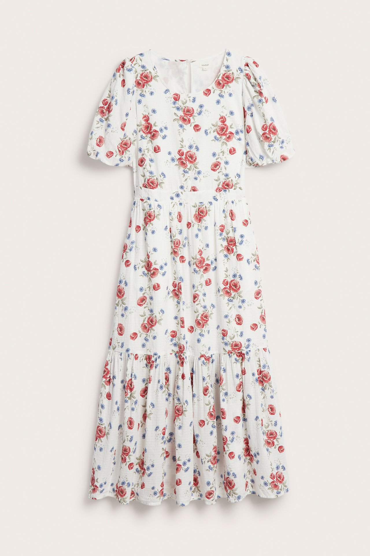 Vorderansicht: Weißes gewebtes Damenkleid mit rotem, blauem Blumendruck, Stufenrock und Ballonärmeln.