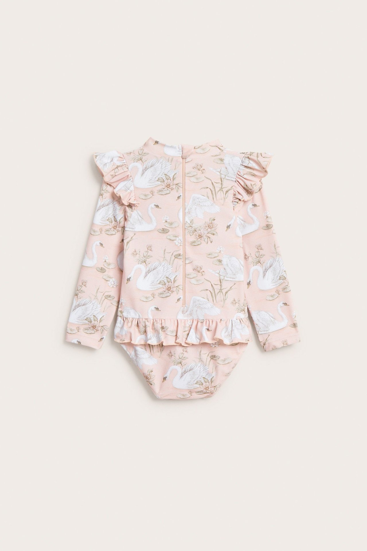 Back view: Pink baby UV swimsuit with swan print, long sleeves, ruffles, and back zipper.