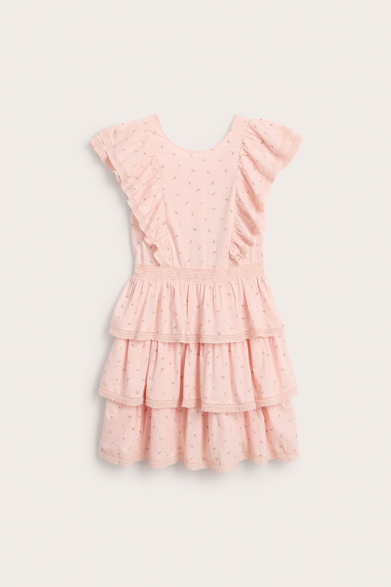 Front view of a light pink patterned woman's dress with ruffled sleeves and tiered skirt with lace trim.