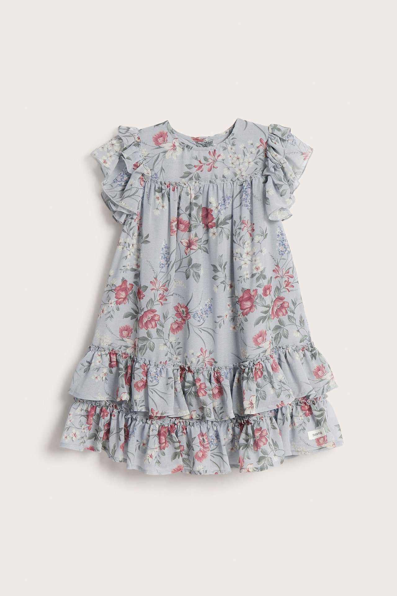 Front view of a kid's light blue floral chiffon dress with ruffle sleeves and a tiered skirt.