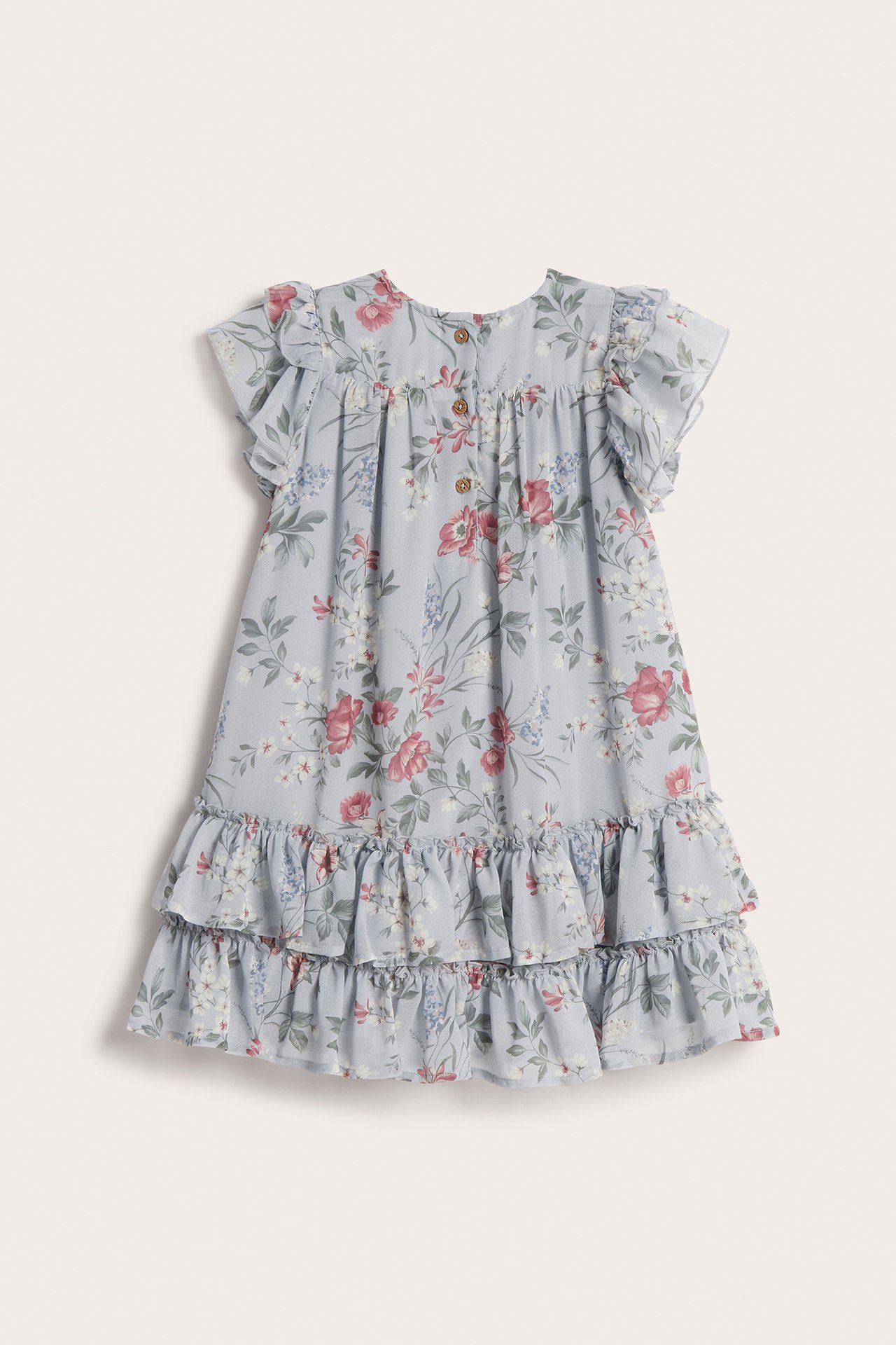Kid's light blue floral chiffon dress, back view, ruffled sleeves, tiered skirt, and back buttons.