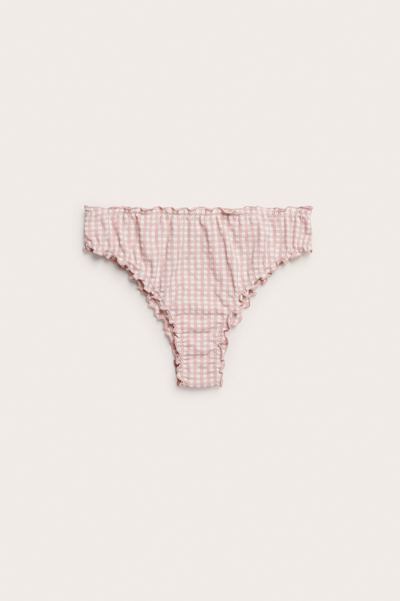 Vorderansicht einer pink karierten Bikinihose mit Rüschen an den Kanten.