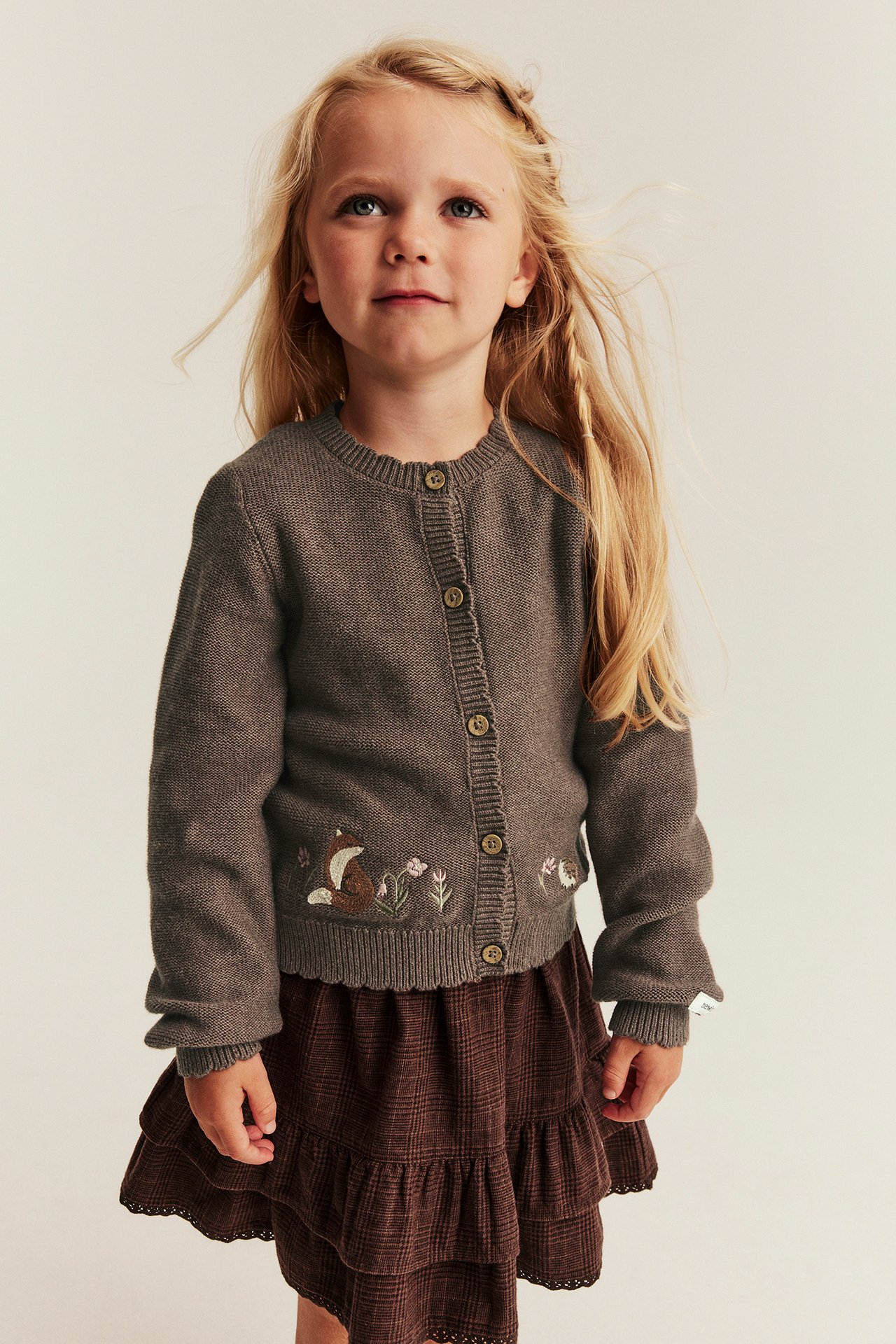 Knitted cardigan with embroidered animals