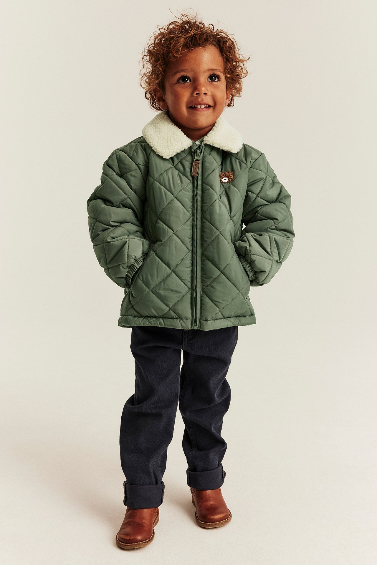 Quilted jacket with pile collar