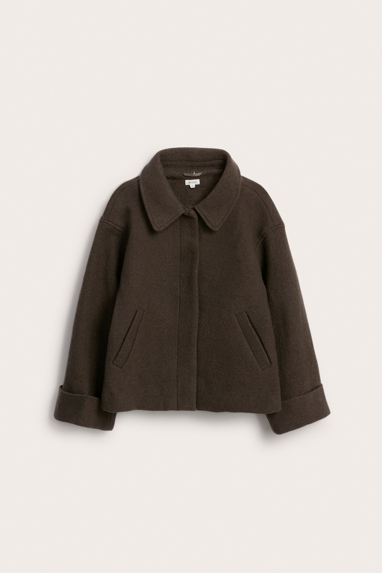 Dark brown textured wool-blend jacket with a collar, buttons, and rolled cuffs, front view.