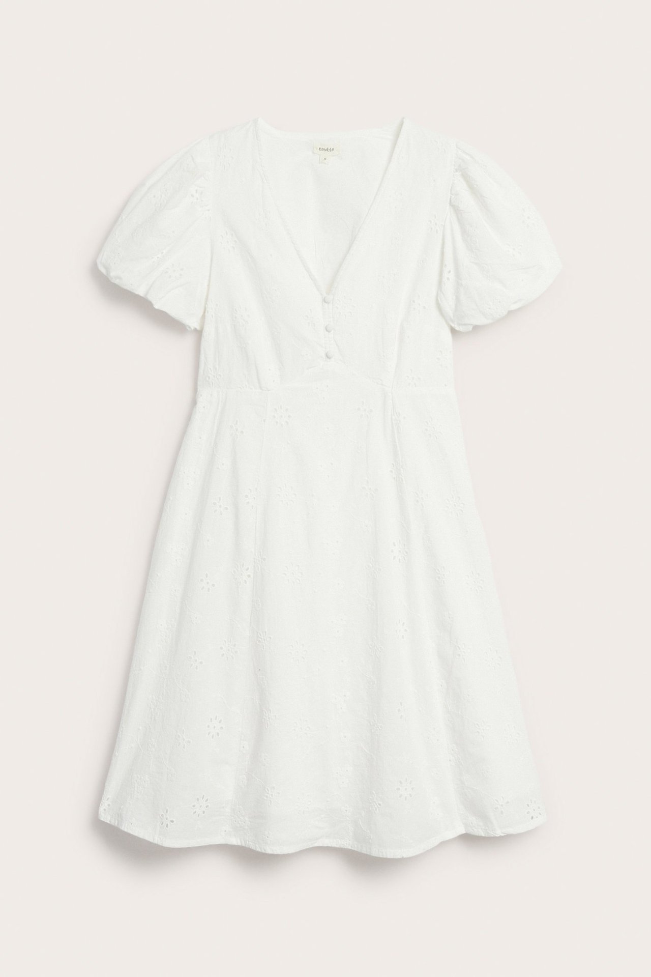 Front view: off-white embroidered cotton dress with short puffy sleeves and flared skirt.