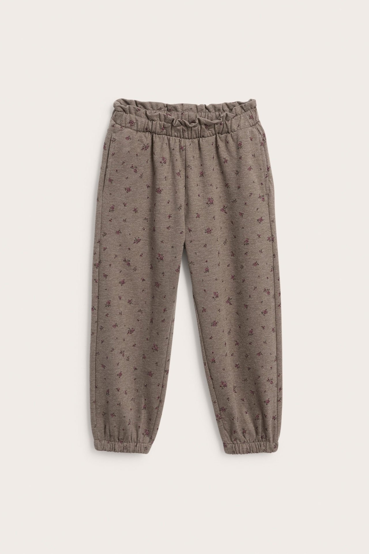 Vorderansicht von braunen geblümten Kinder-Sweatpants mit Gummizug an Taille und Bündchen.
