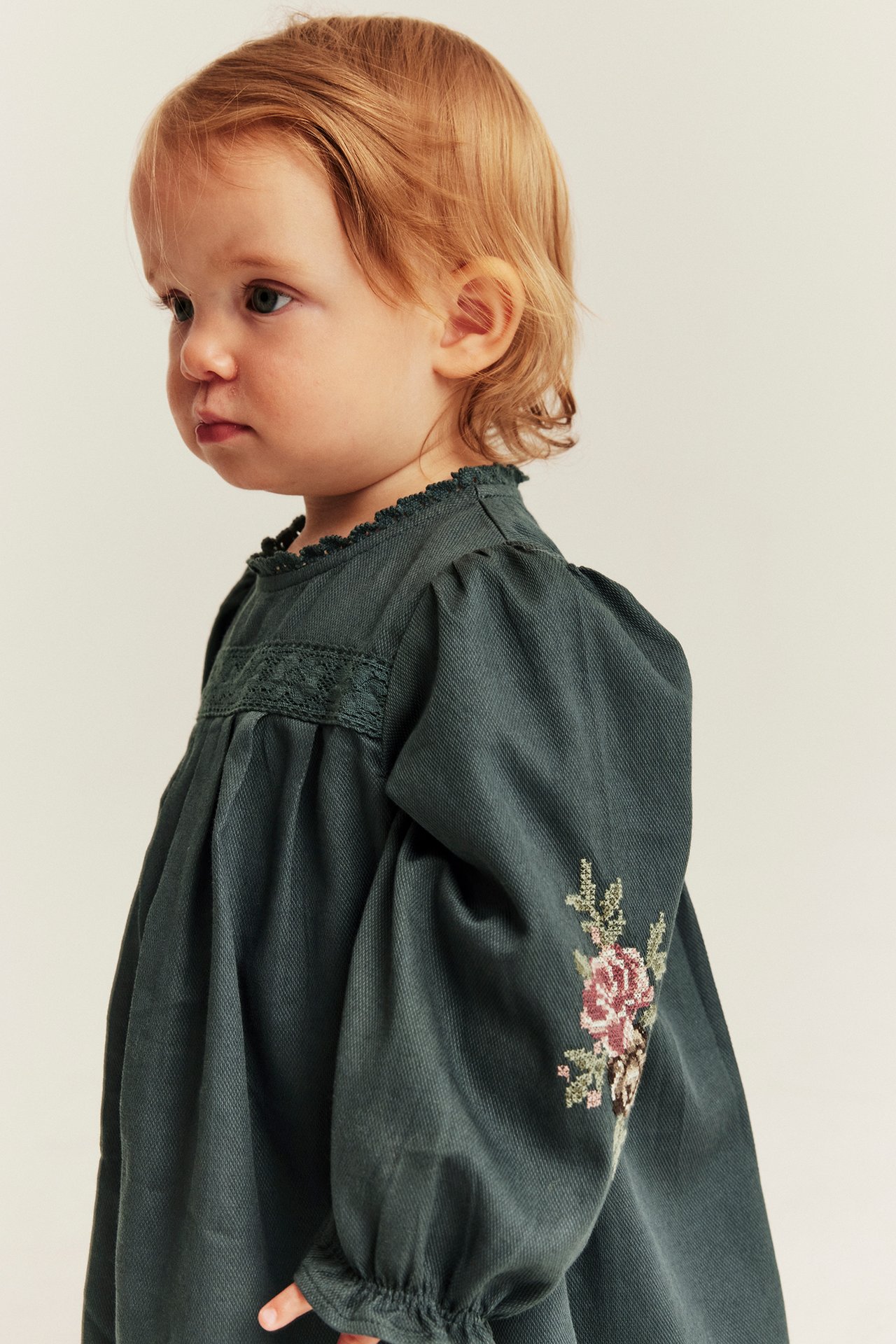 Dress with cross-stitch embroidery
