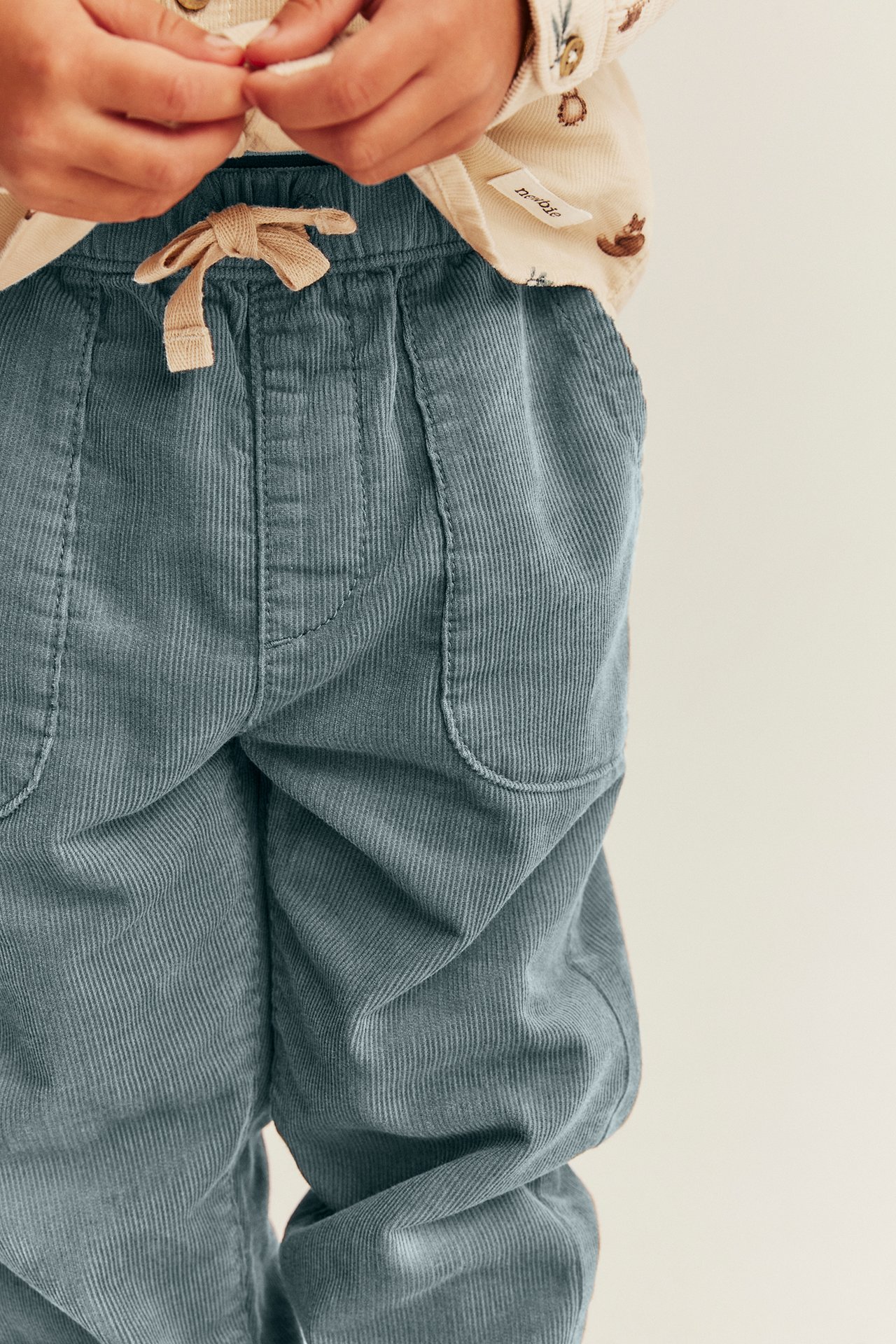 Elasticated corduroy trousers