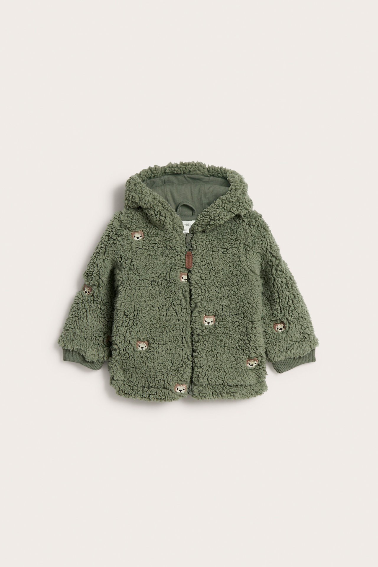 Front view, kid's dark green hooded pile jacket with allover teddy bear embroidery and front zipper.