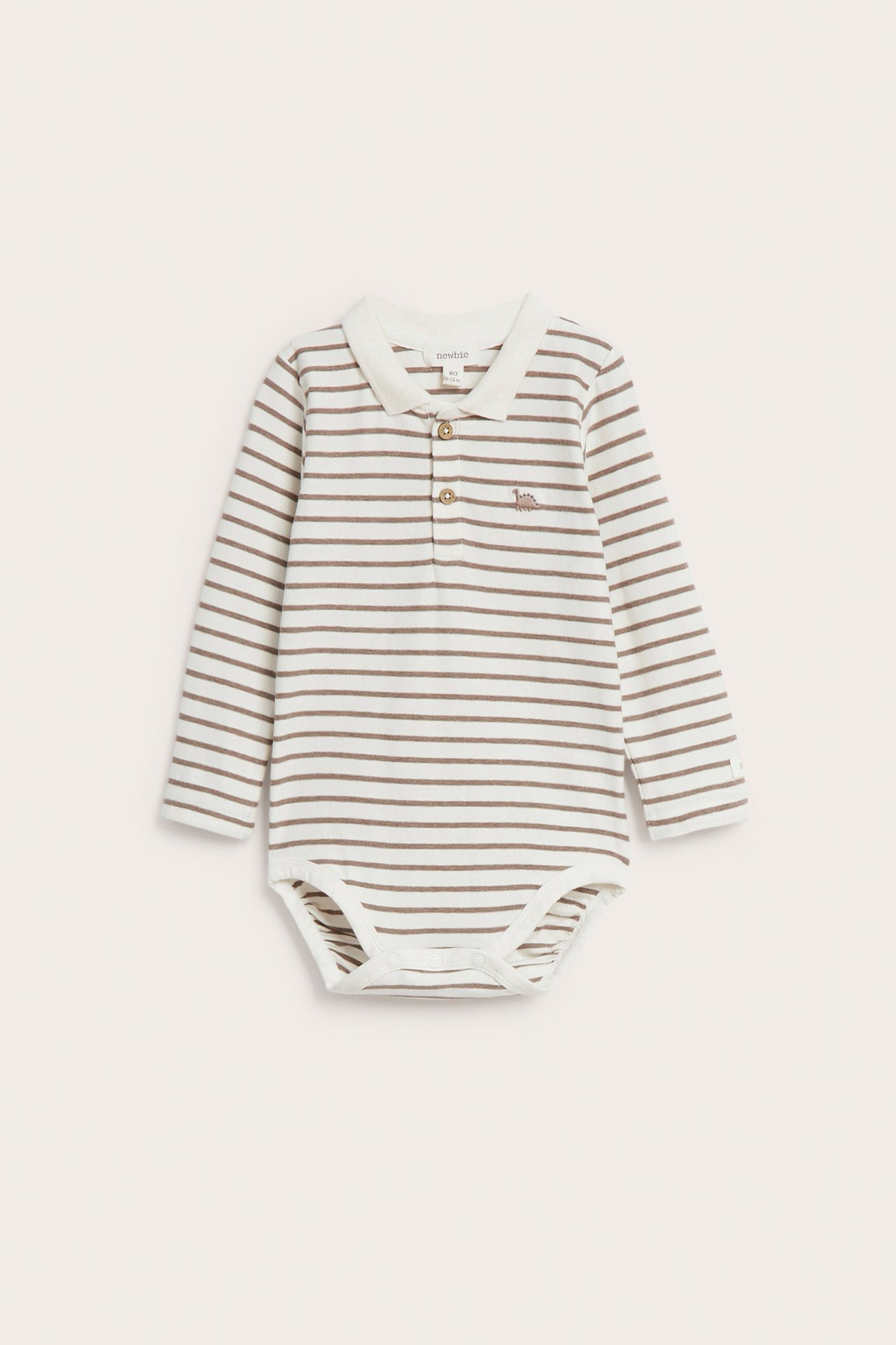 Front view of a baby's white and brown striped long-sleeved polo bodysuit with a dinosaur embroidery.