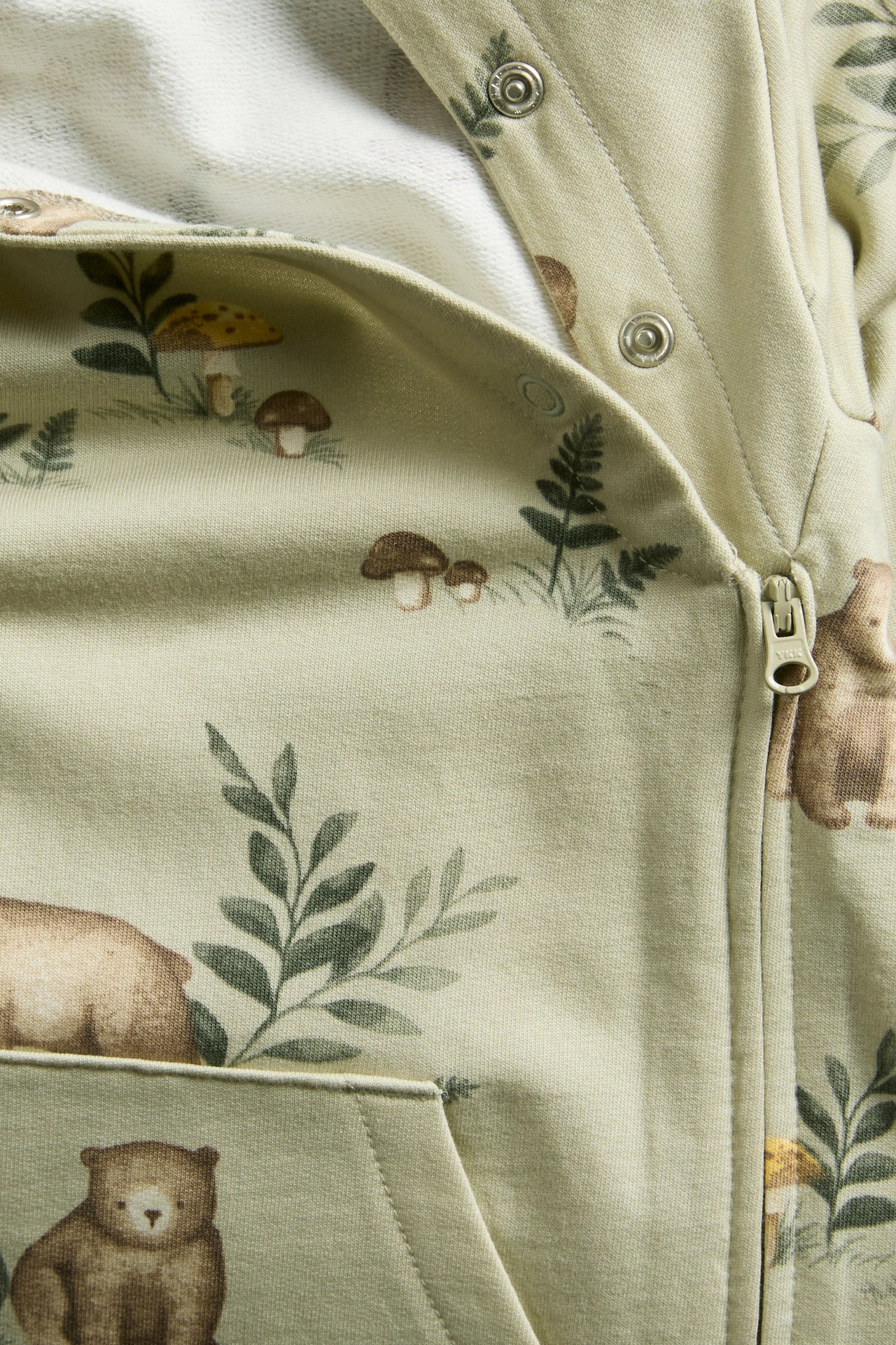 Full-patterned jumpsuit with hood