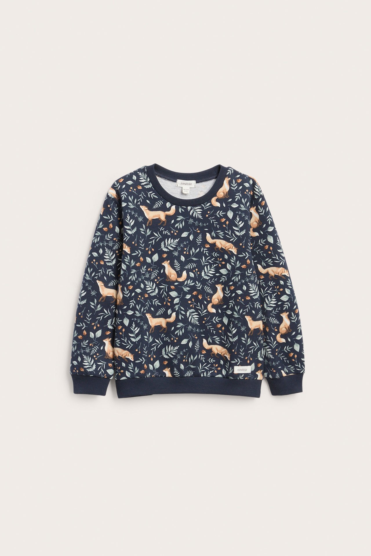 Vorderansicht eines dunkelblauen Langarm-Sweatshirts für Kinder mit Fuchs- und Blattmuster.