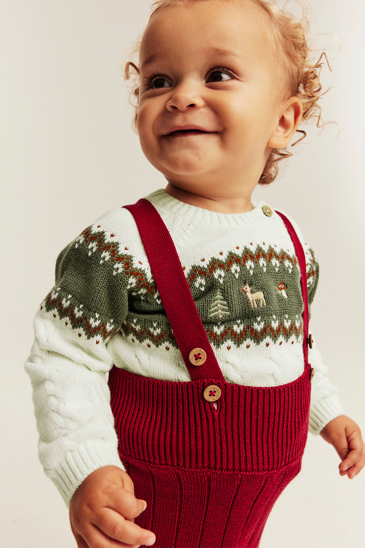 Knitted sweater with embroidery
