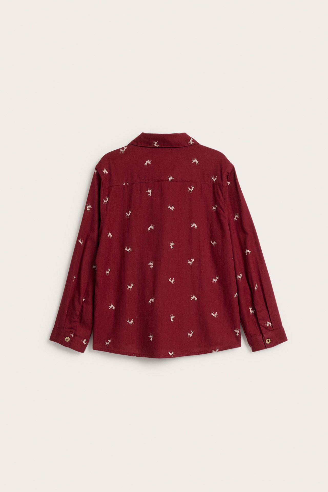 Back view of a maroon long-sleeved shirt with a white deer pattern.