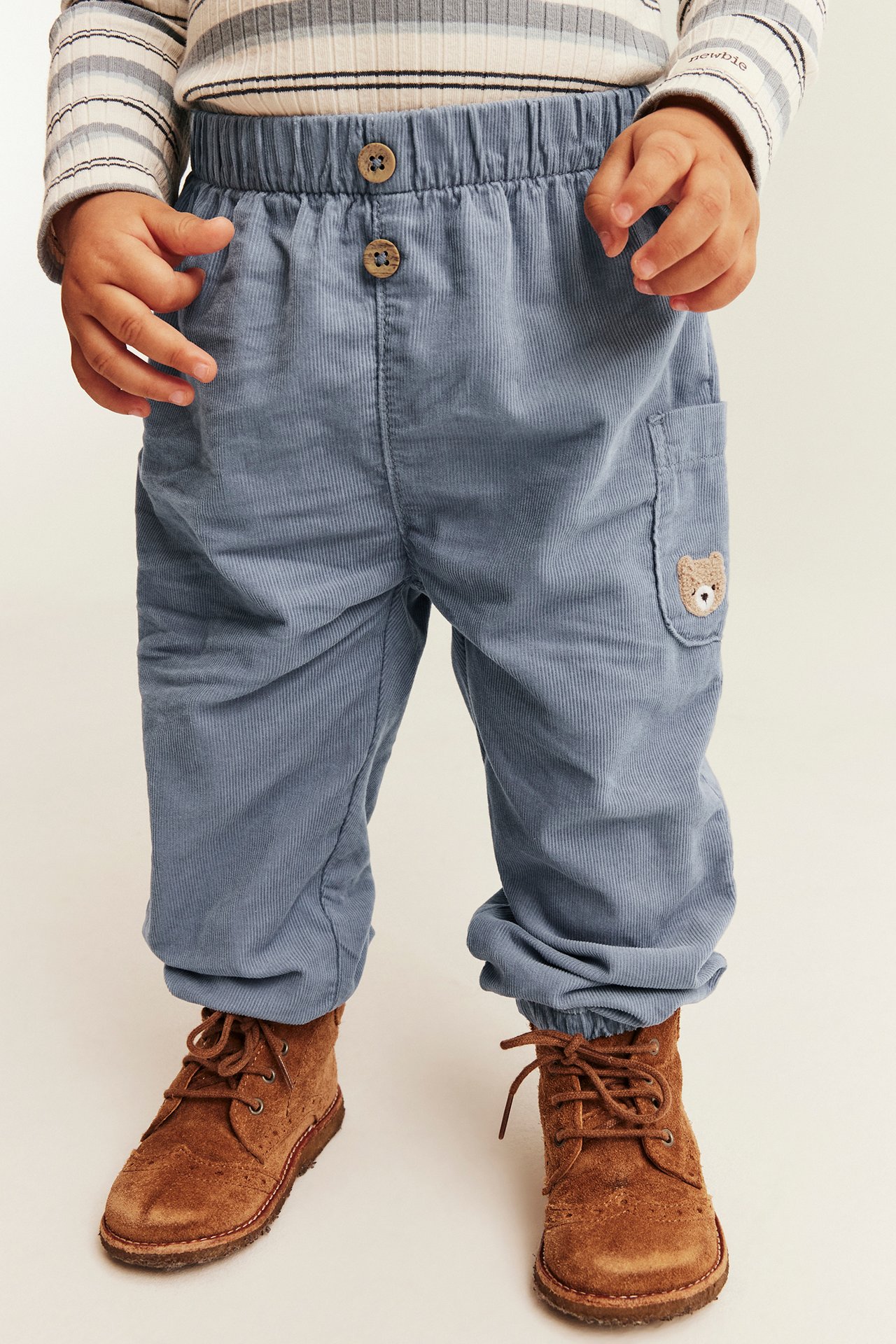 Corduroy pants with embroidery