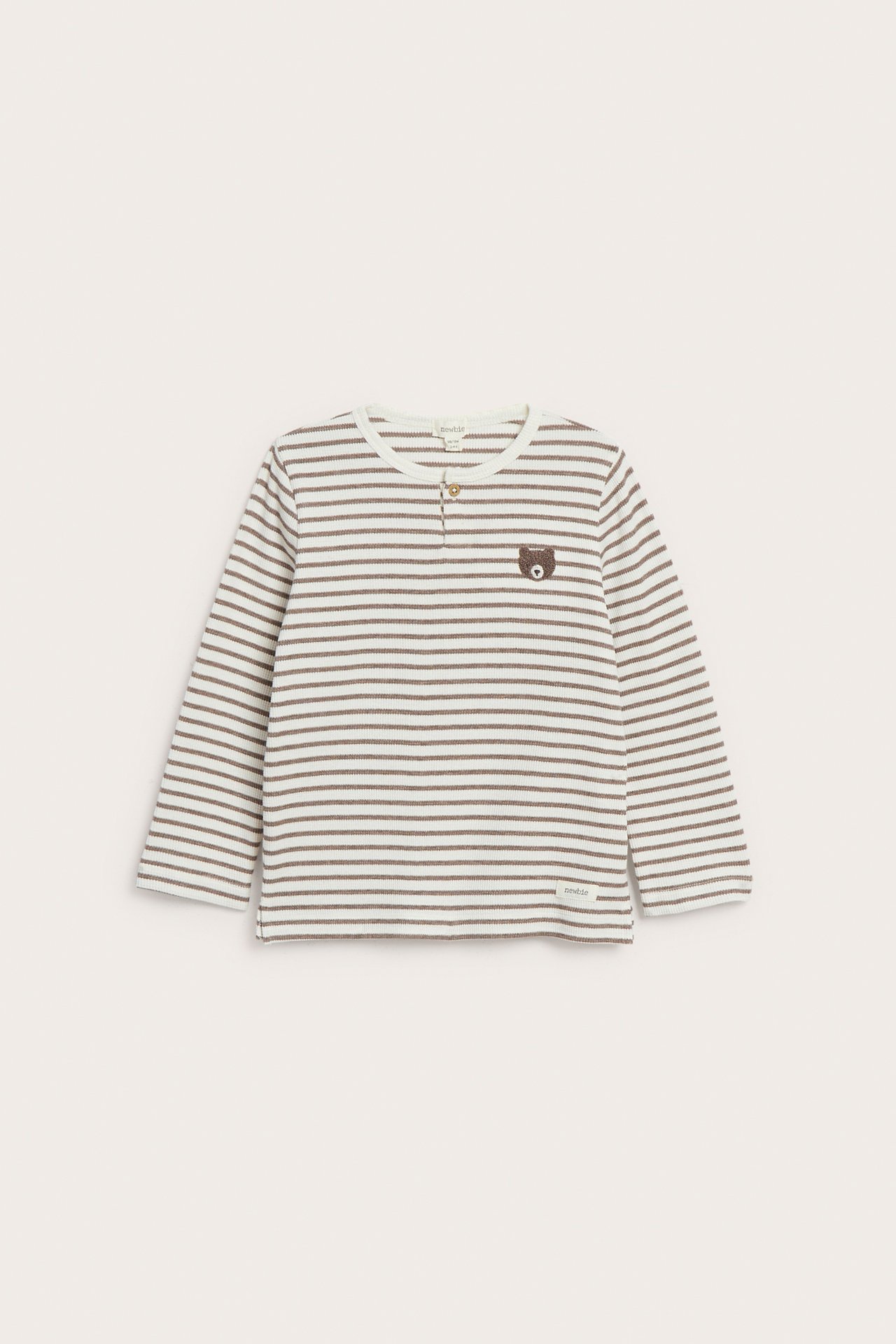 Front view: Baby's striped ribbed long-sleeved top with a henley collar and bear embroidery.