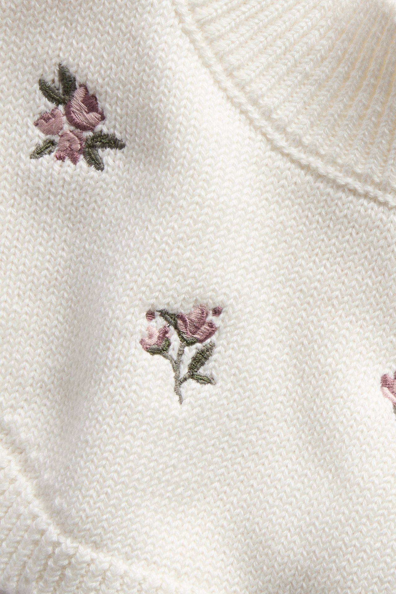Floral knitted polo neck