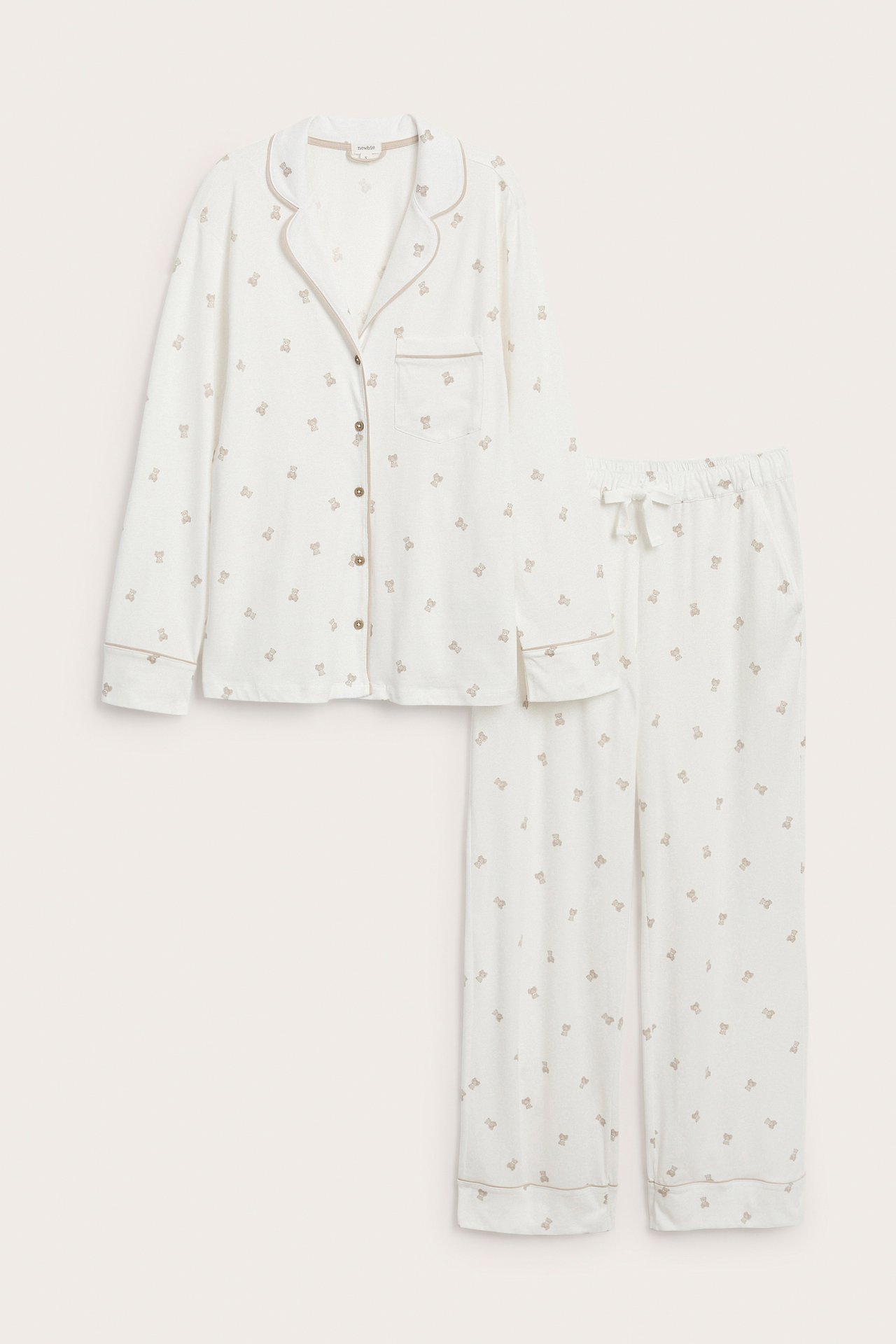 Front view, off-white bear print pajama set, button-up shirt and elastic waist pants.