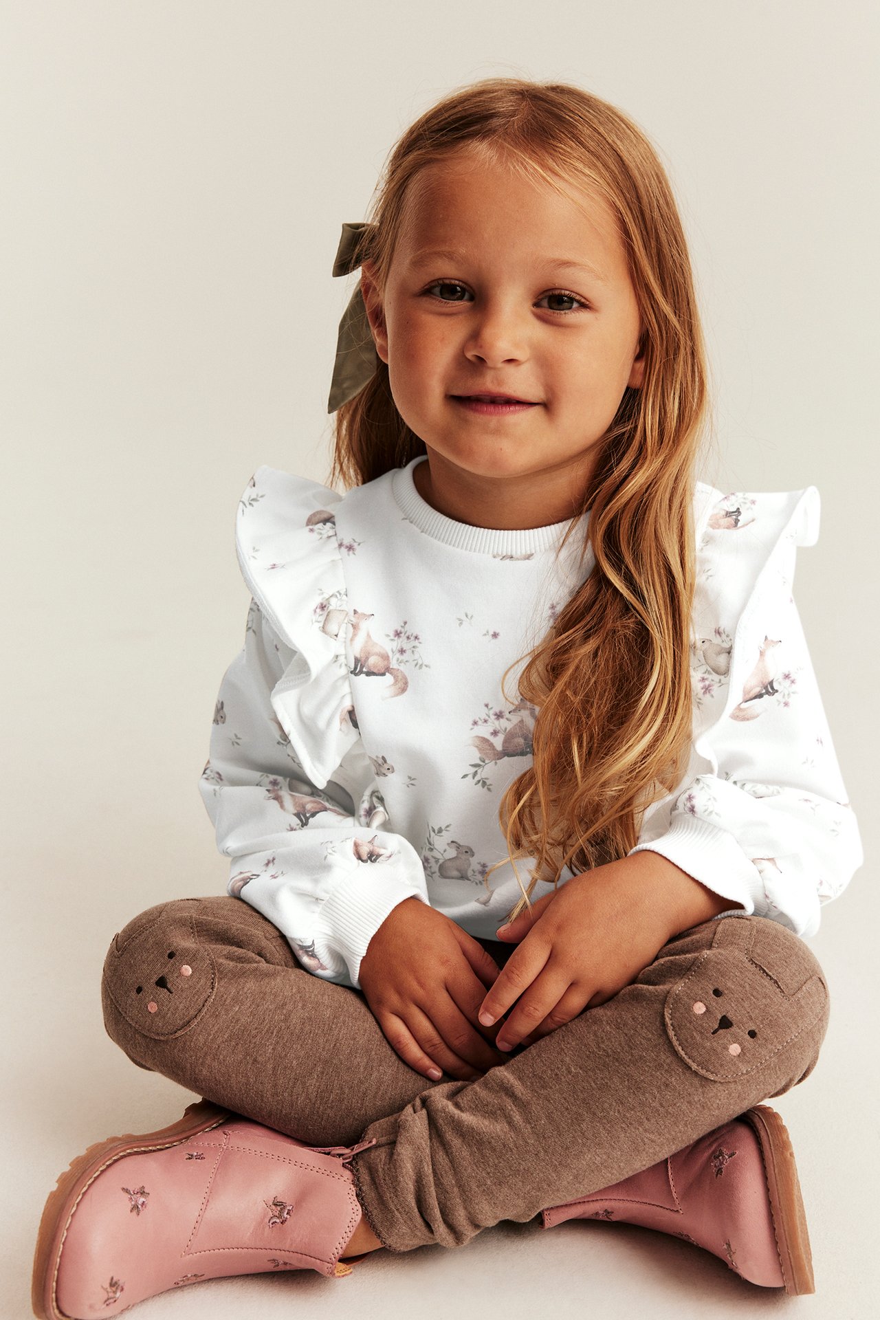 Patterned sweatshirt with frills