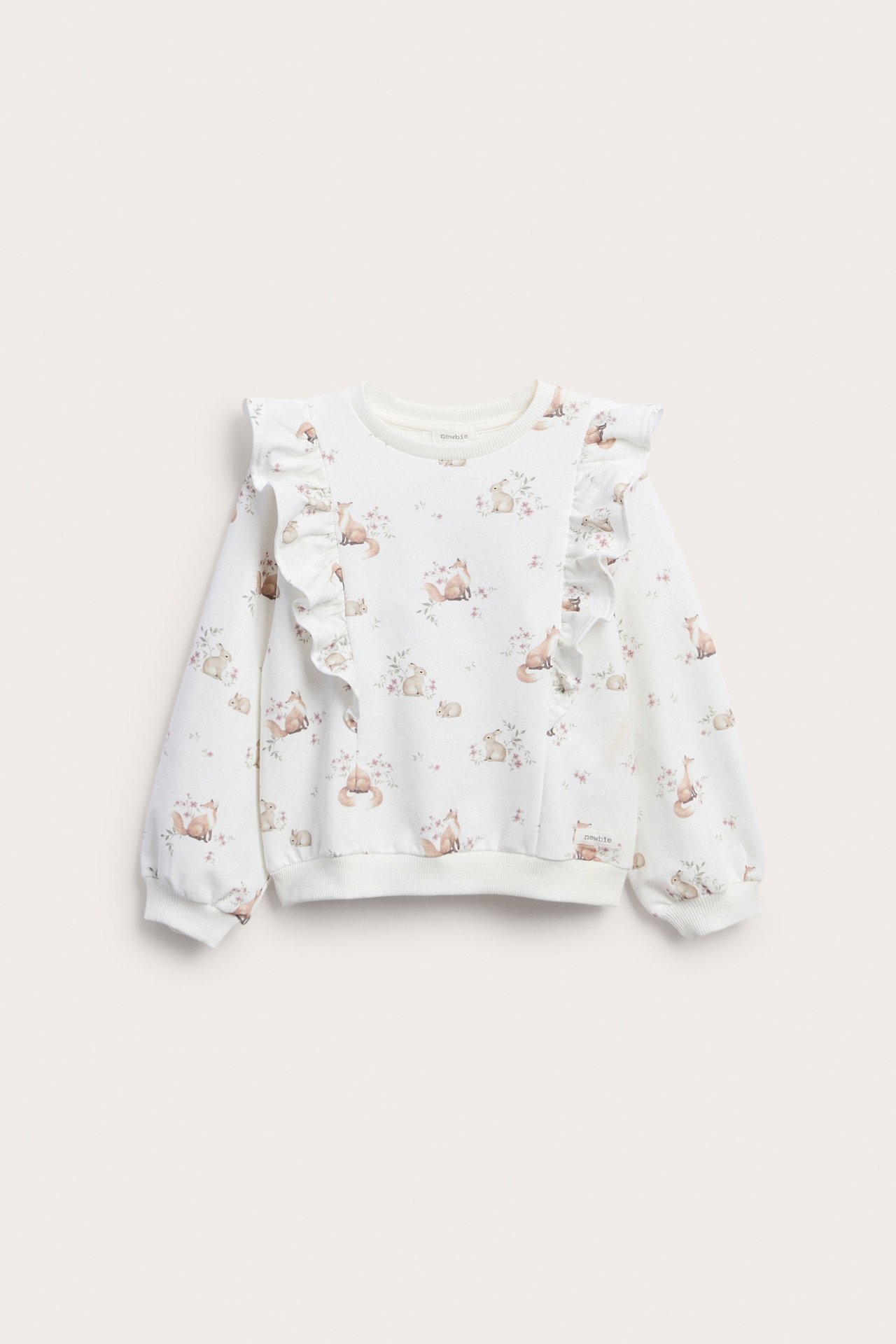 Weißes Baby-Sweatshirt mit Schulterrüschen und Tiermuster, Vorderansicht.