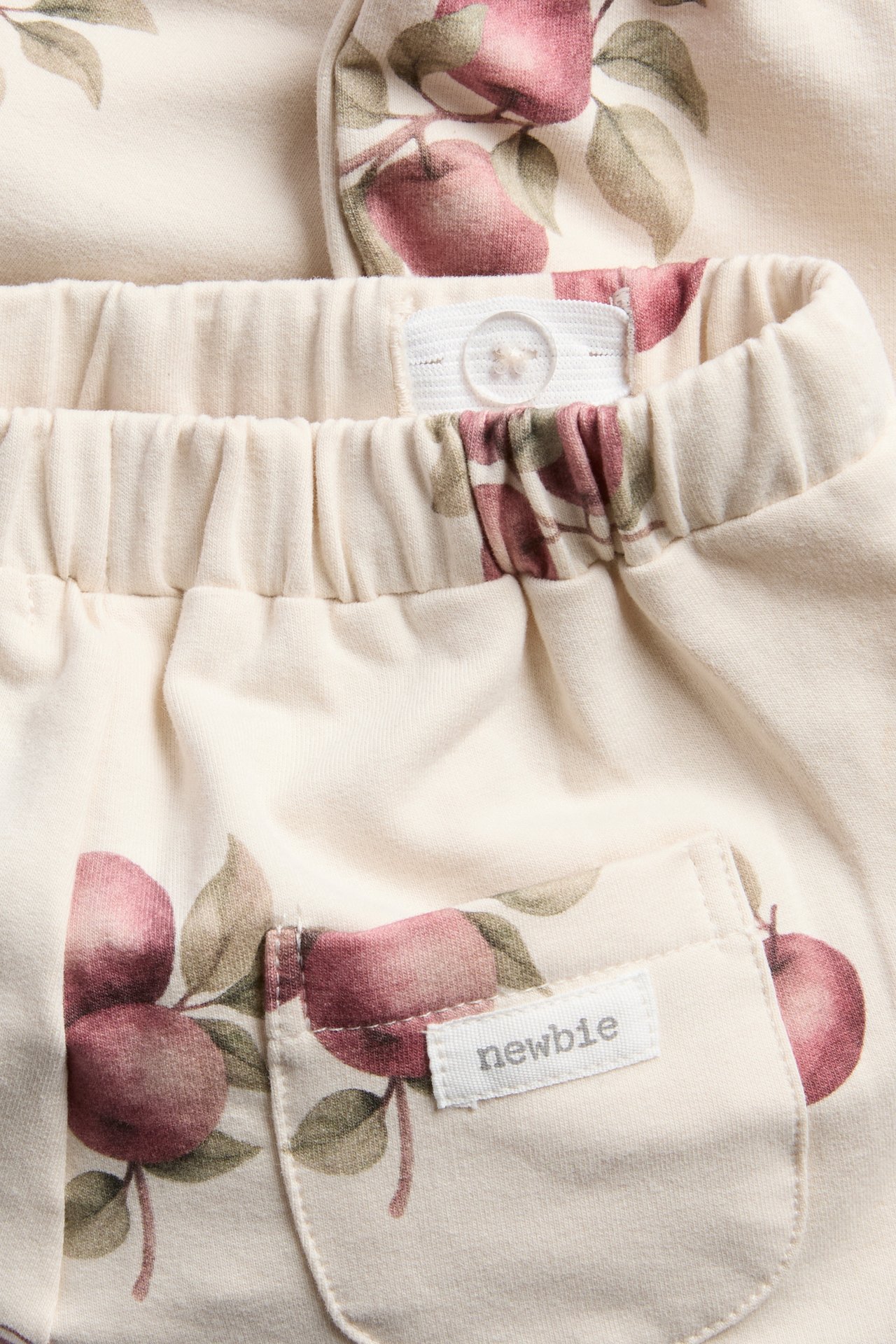 Jogging bottoms with apple pattern