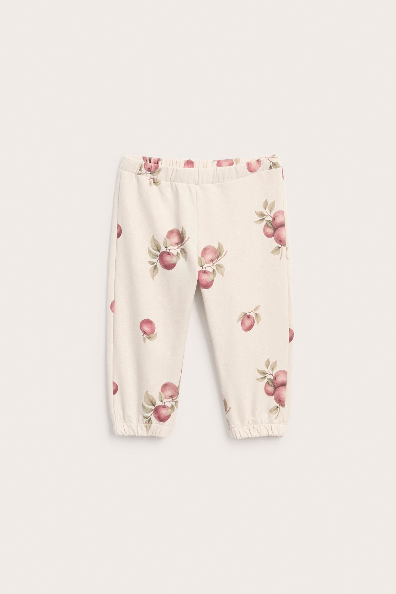 Jogging bottoms with apple pattern
