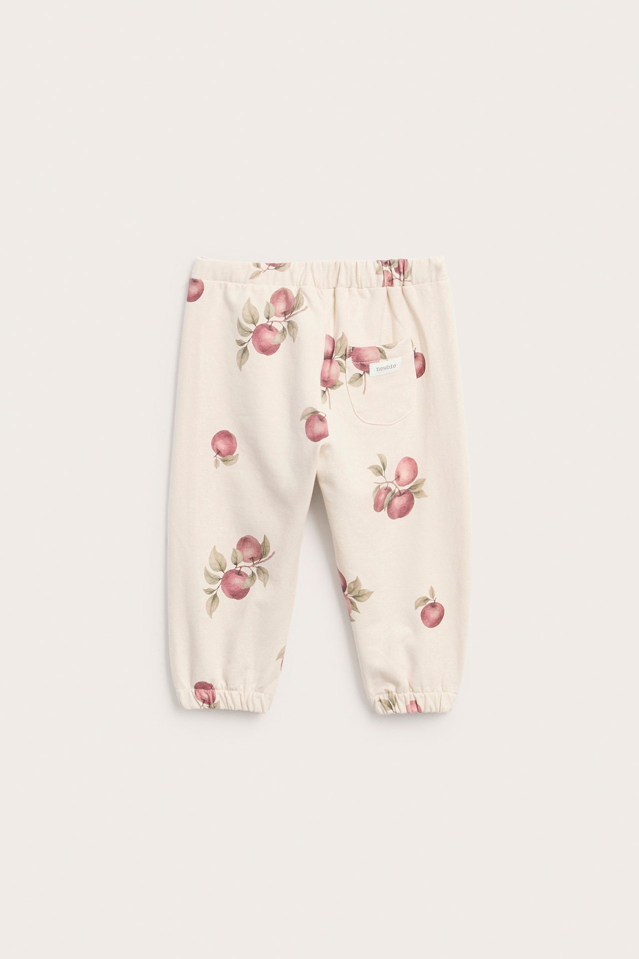 Jogging bottoms with apple pattern