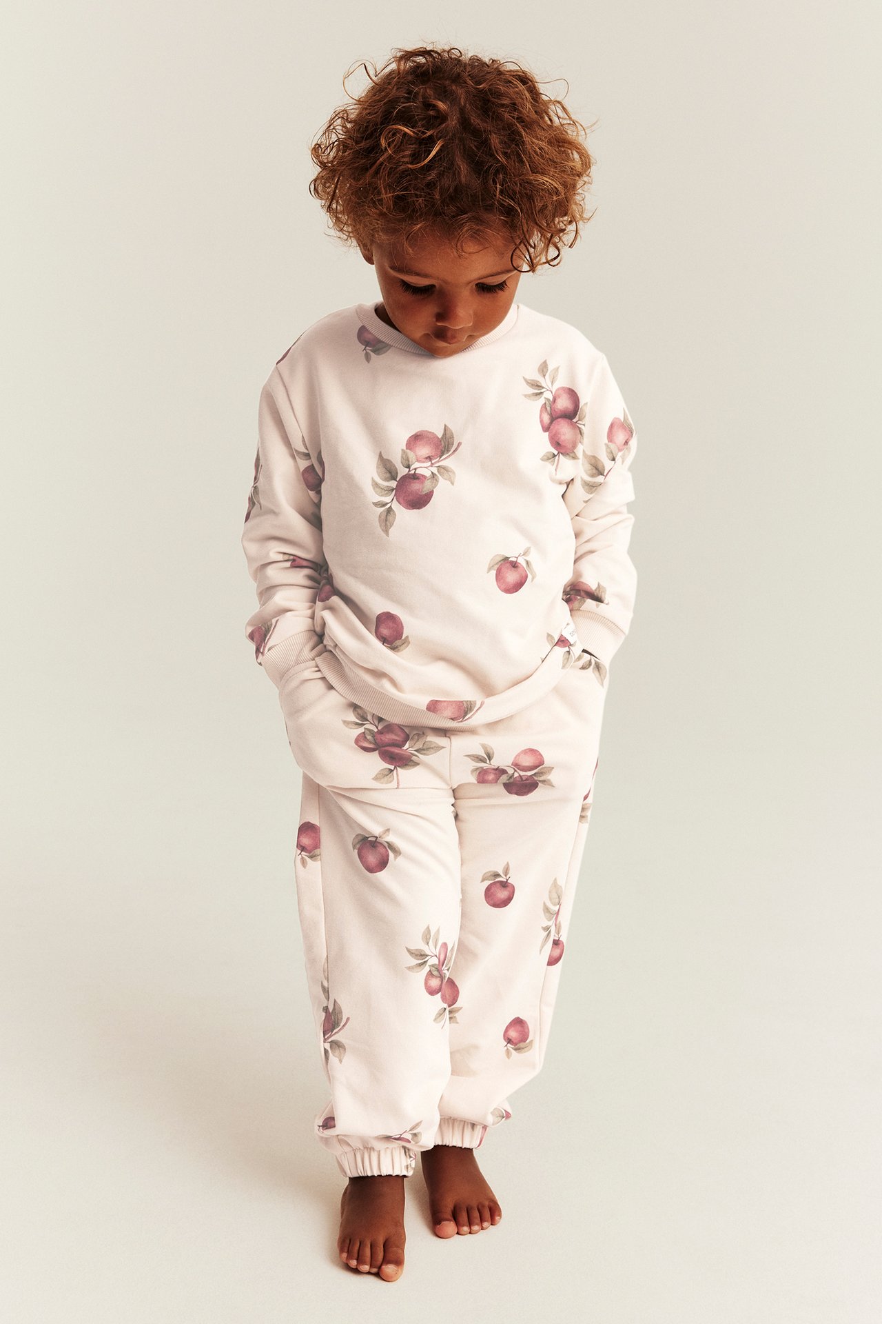 Jogging bottoms with apple pattern