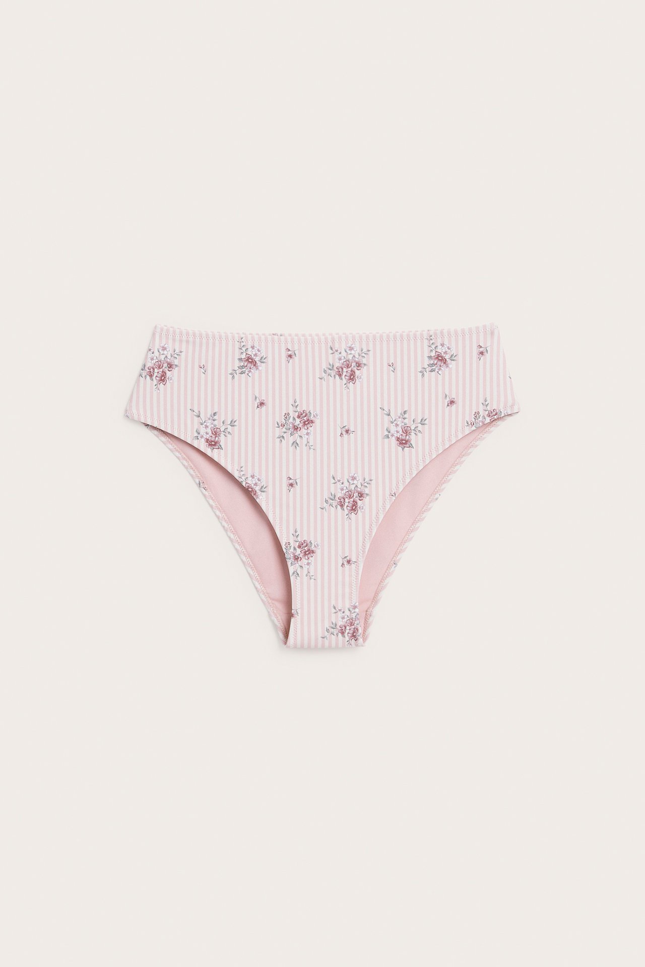 Front view of pink and white striped high-waisted briefs with a floral print.
