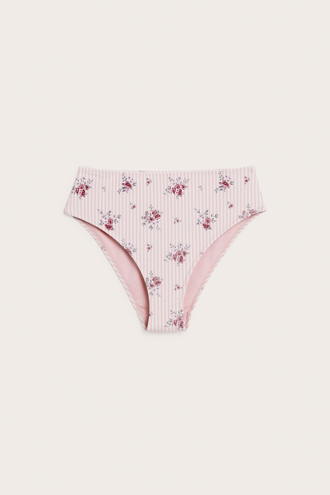 Vorderansicht von rosa-weiß gestreiften, geblümten High-Waist Damenslips.